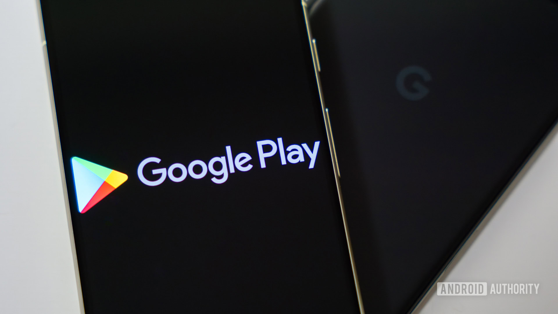 Google Play Store logo on smartphone stock photo (4) Google Play Store logo on smartphone stock photo (4)