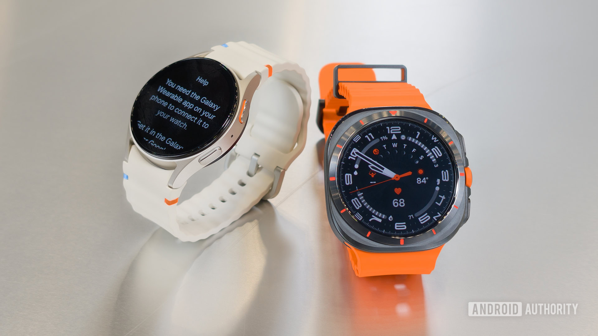 Samsung Galaxy Watch Ultra and Samsung Galaxy Watch 7 on Table Next to Each Other Samsung Galaxy Watch Ultra and Samsung Galaxy Watch 7 on Table Next to Each Other