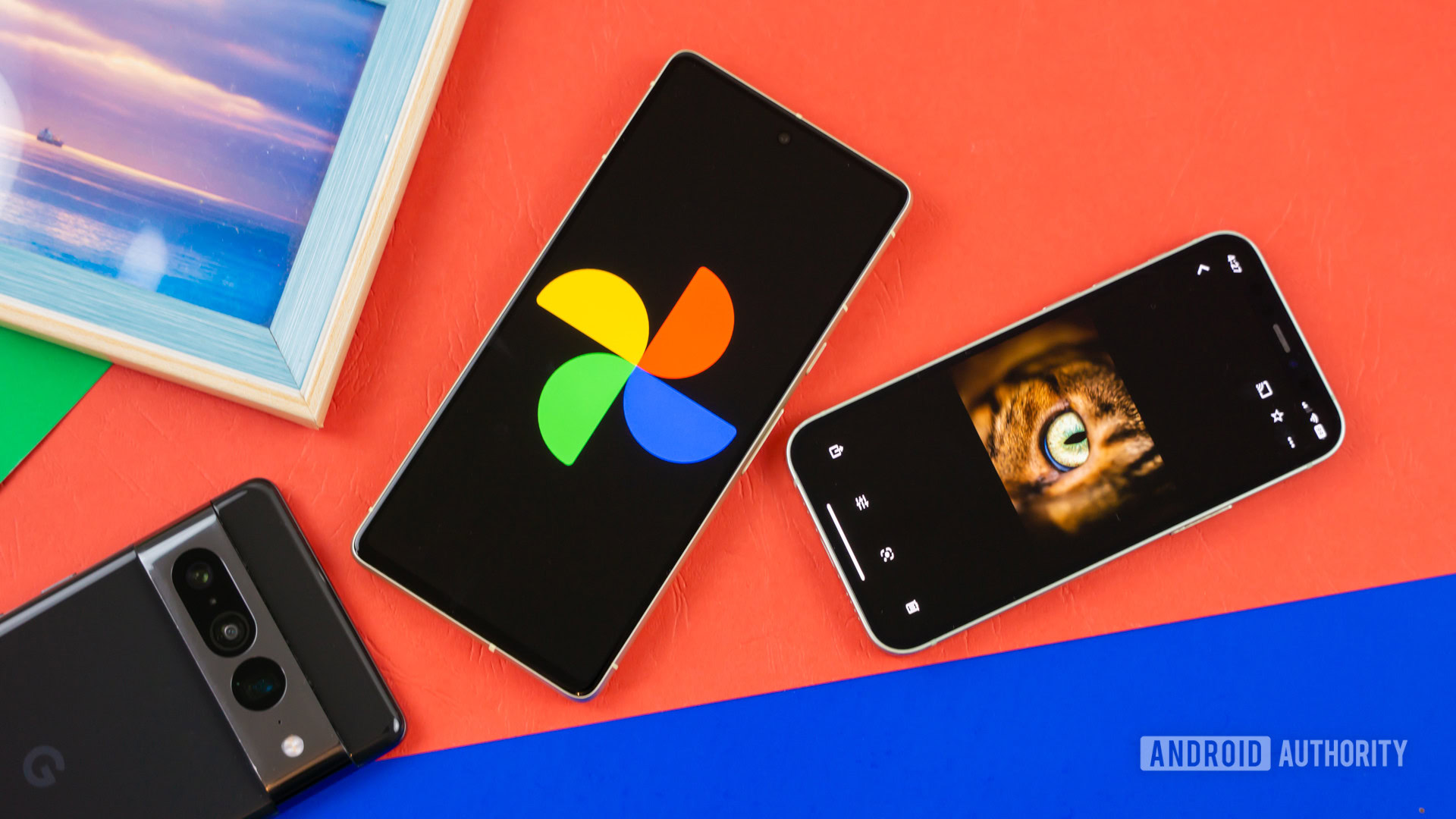Google Photos logo on smartphone next to other devices and picture frame Stock photo 3 Google Photos logo on smartphone next to other devices and picture frame Stock photo 3