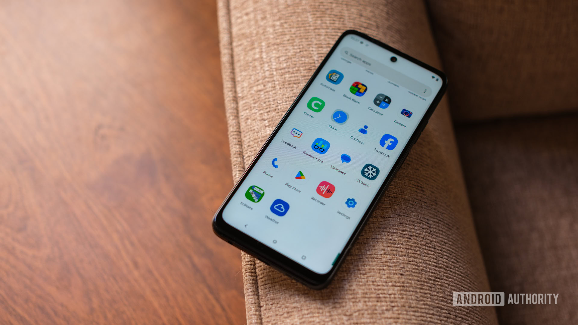 Motorola Moto G 5G (2025) bloatware app drawer on couch Motorola Moto G 5G (2025) bloatware app drawer on couch