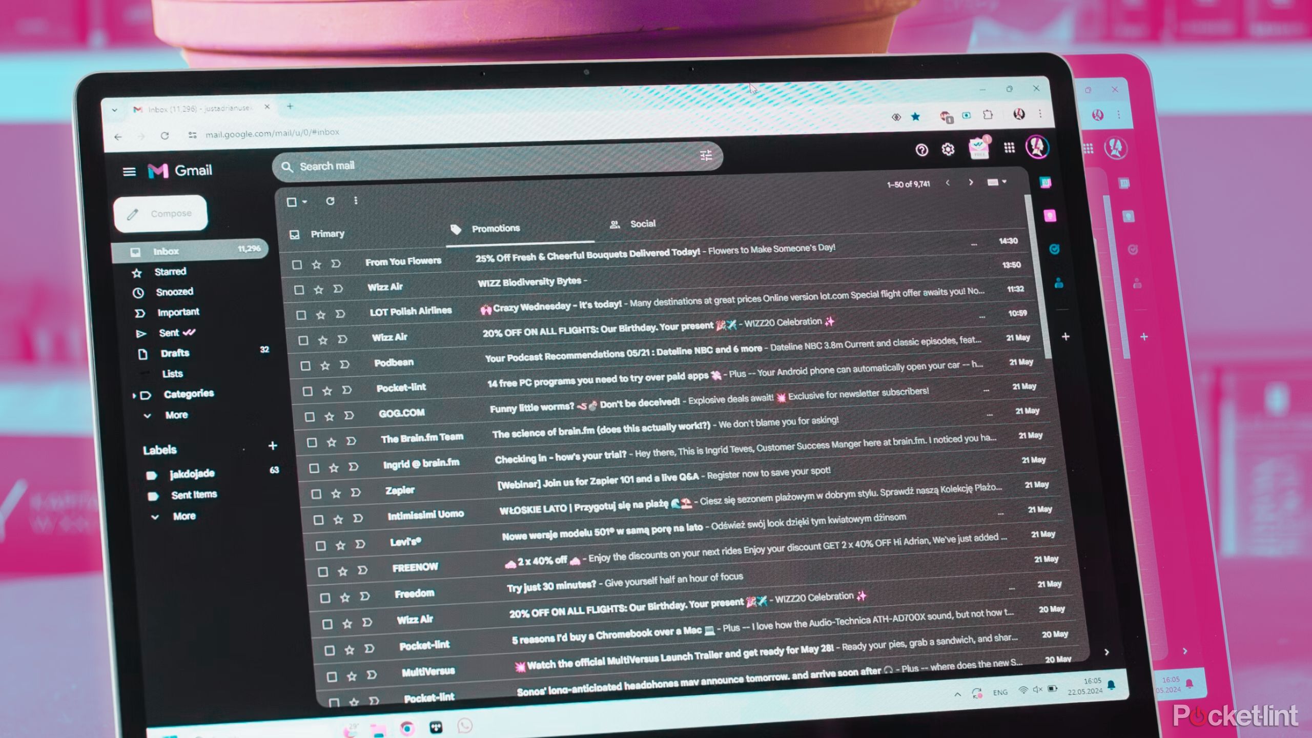 Gmail inbox in night mode on a laptop.