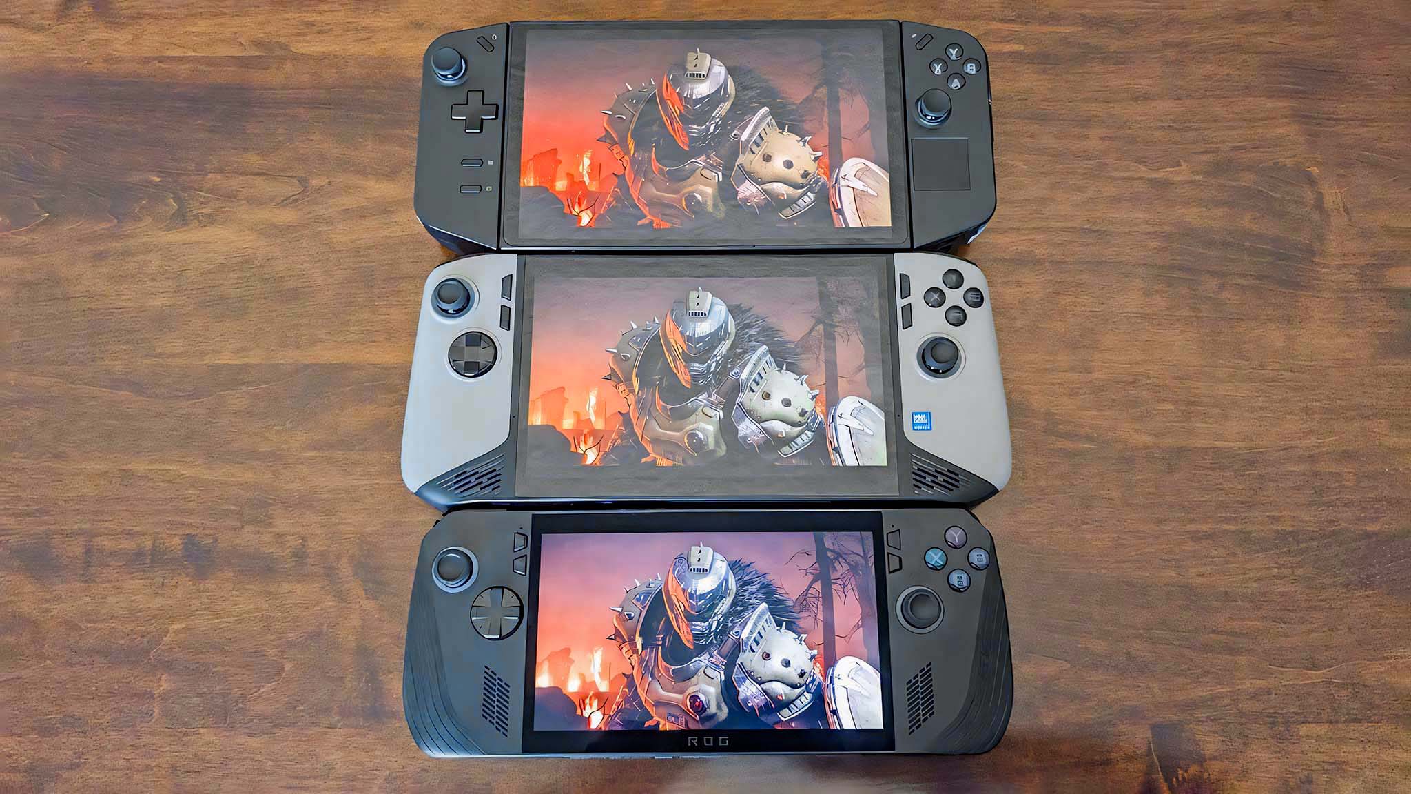 Lenovo Legion Go, MSI Claw 8 AI+, and ROG Ally X all displaying the same DOOM: The Dark Ages image.