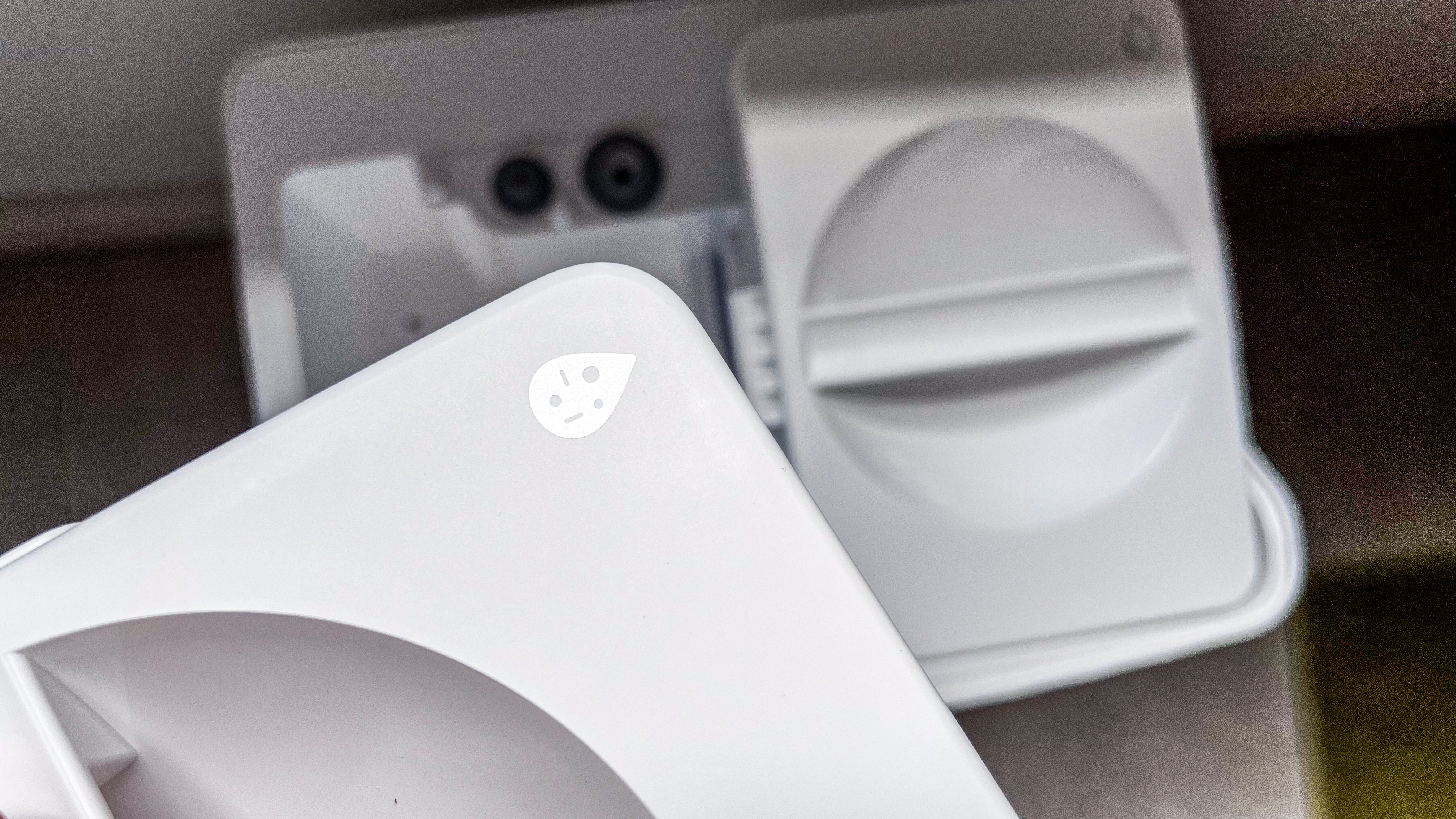 The dirty water icon on a tank in the Roborock Qrevo Edge dock
