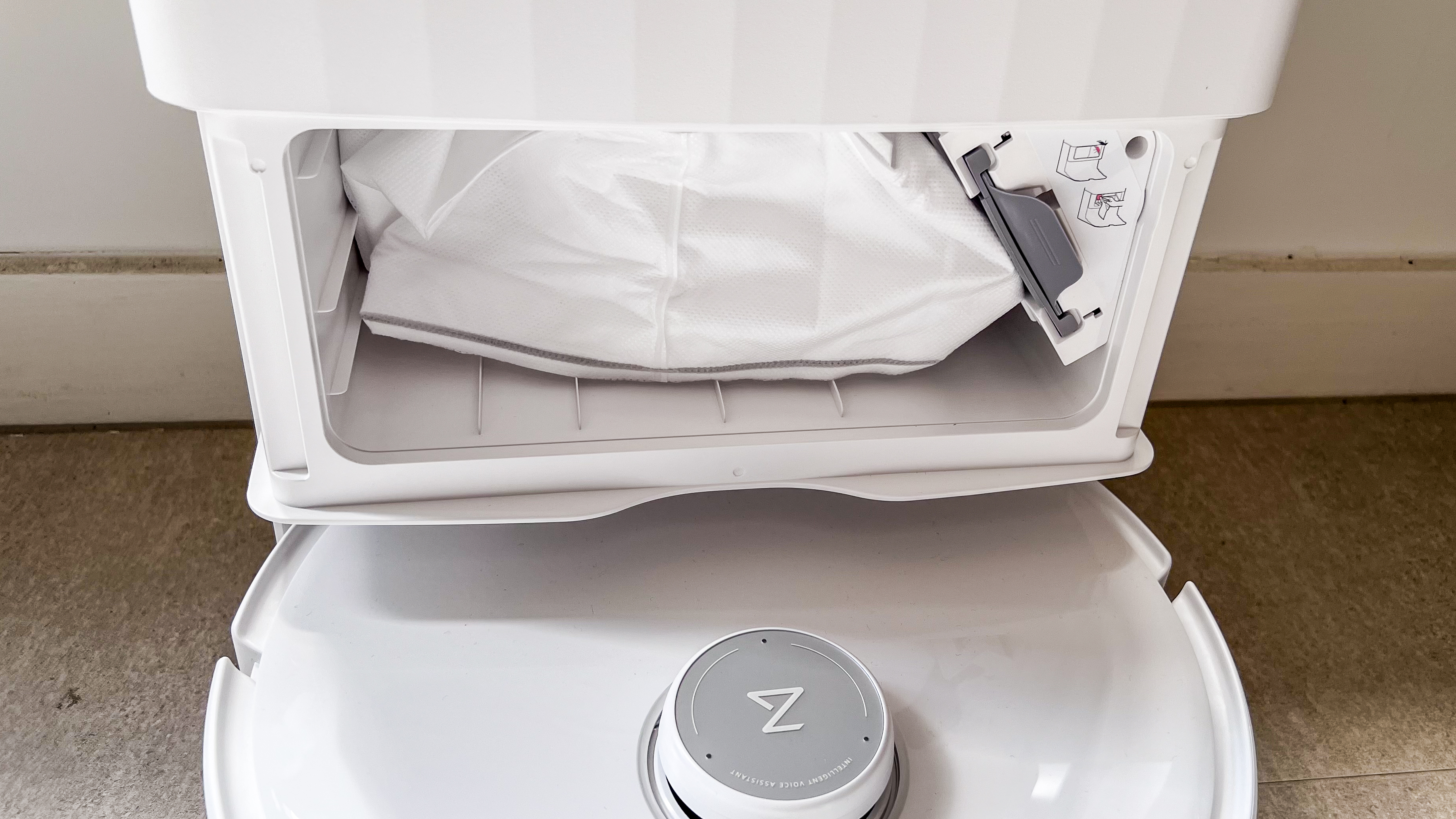 A dust bag inside the Roborock Qrevo Edge dock