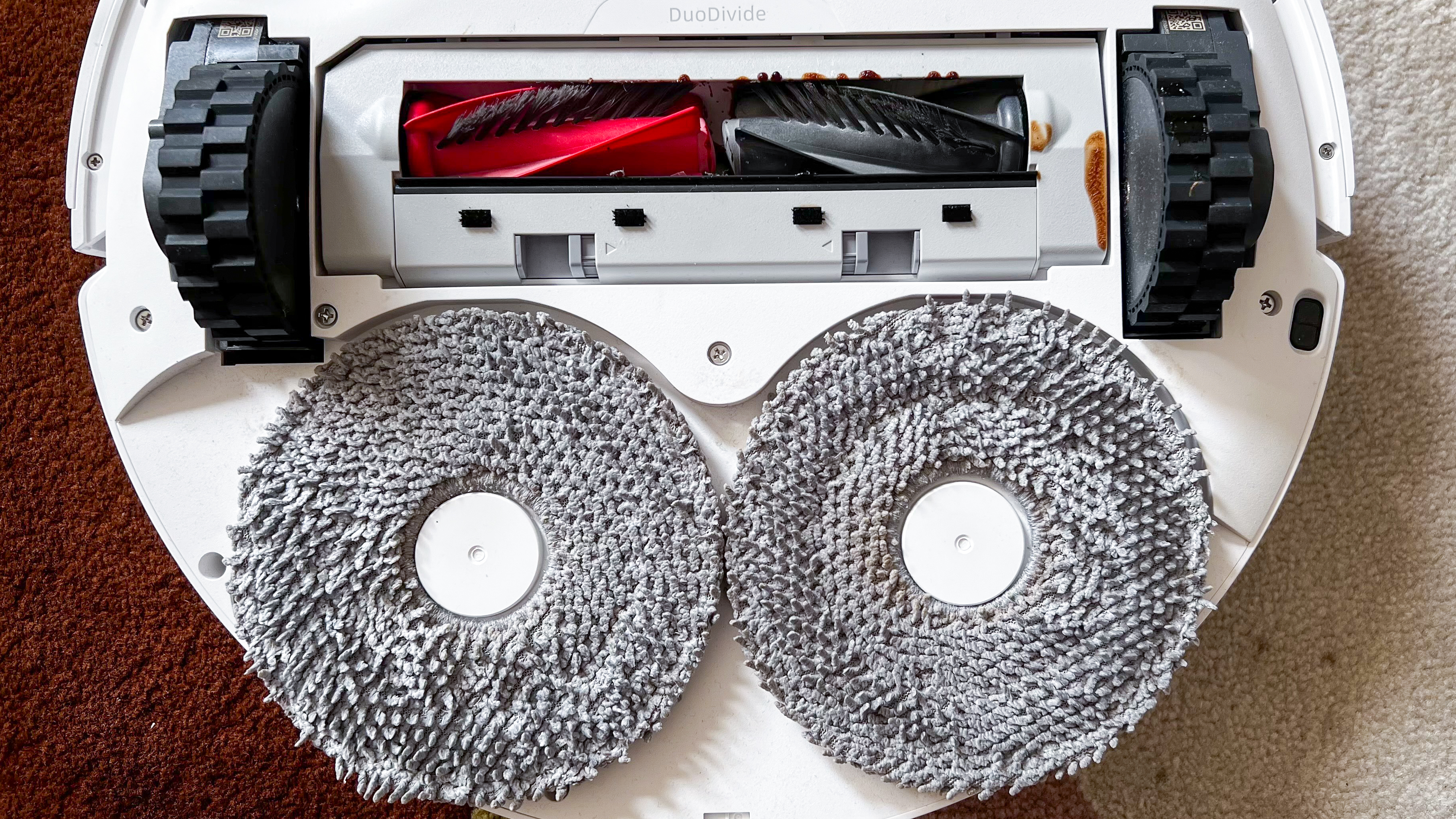 Washed mop pads on the underside of the Roborock Qrevo Edge