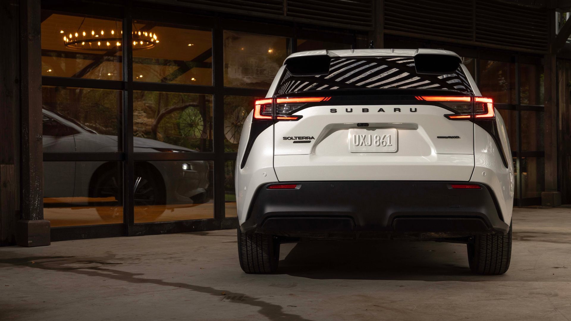 Rear-end shot of the 2026 Subaru Solterra parked indoors.