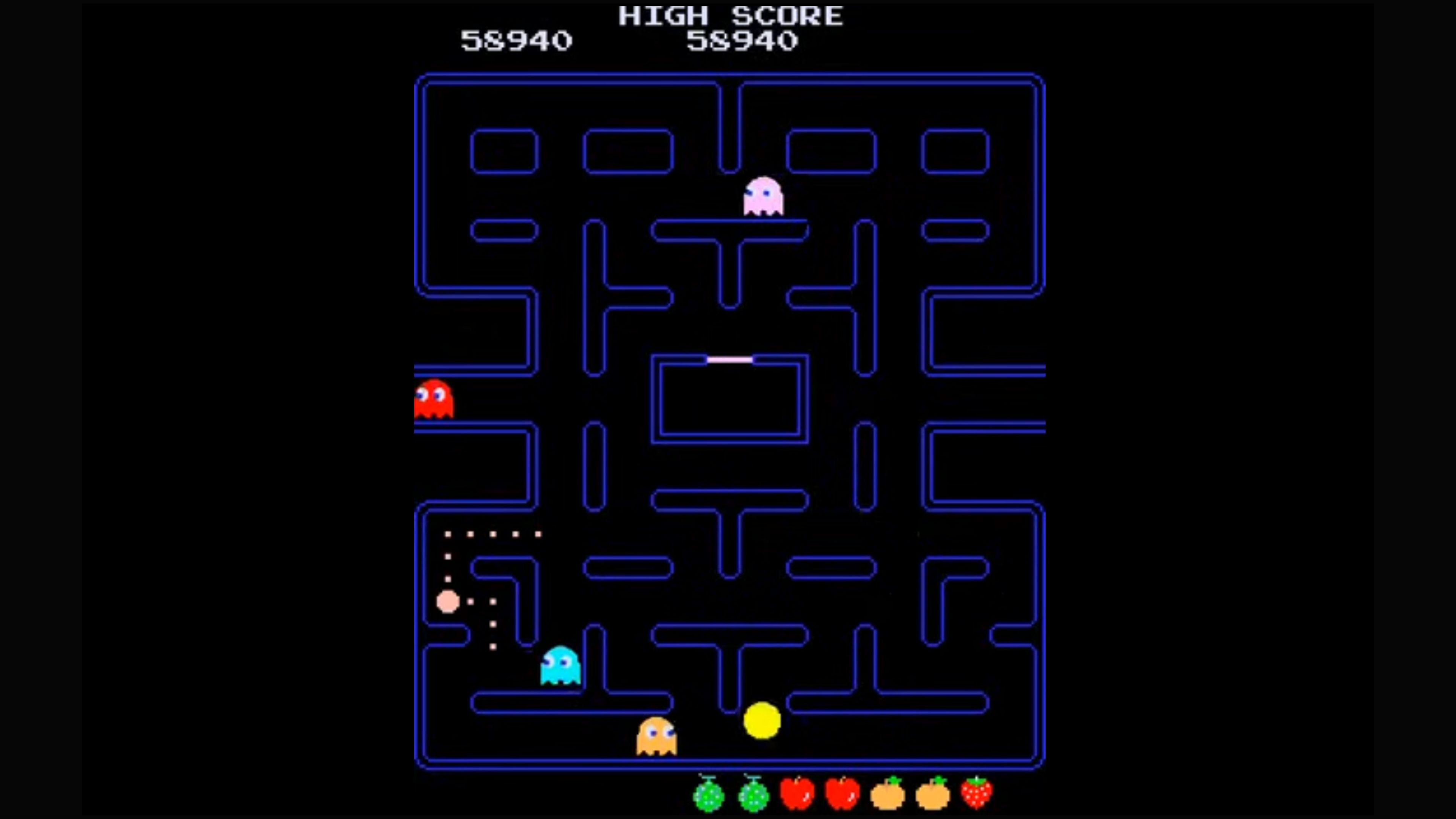 The classic Pac-Man game on a black background.