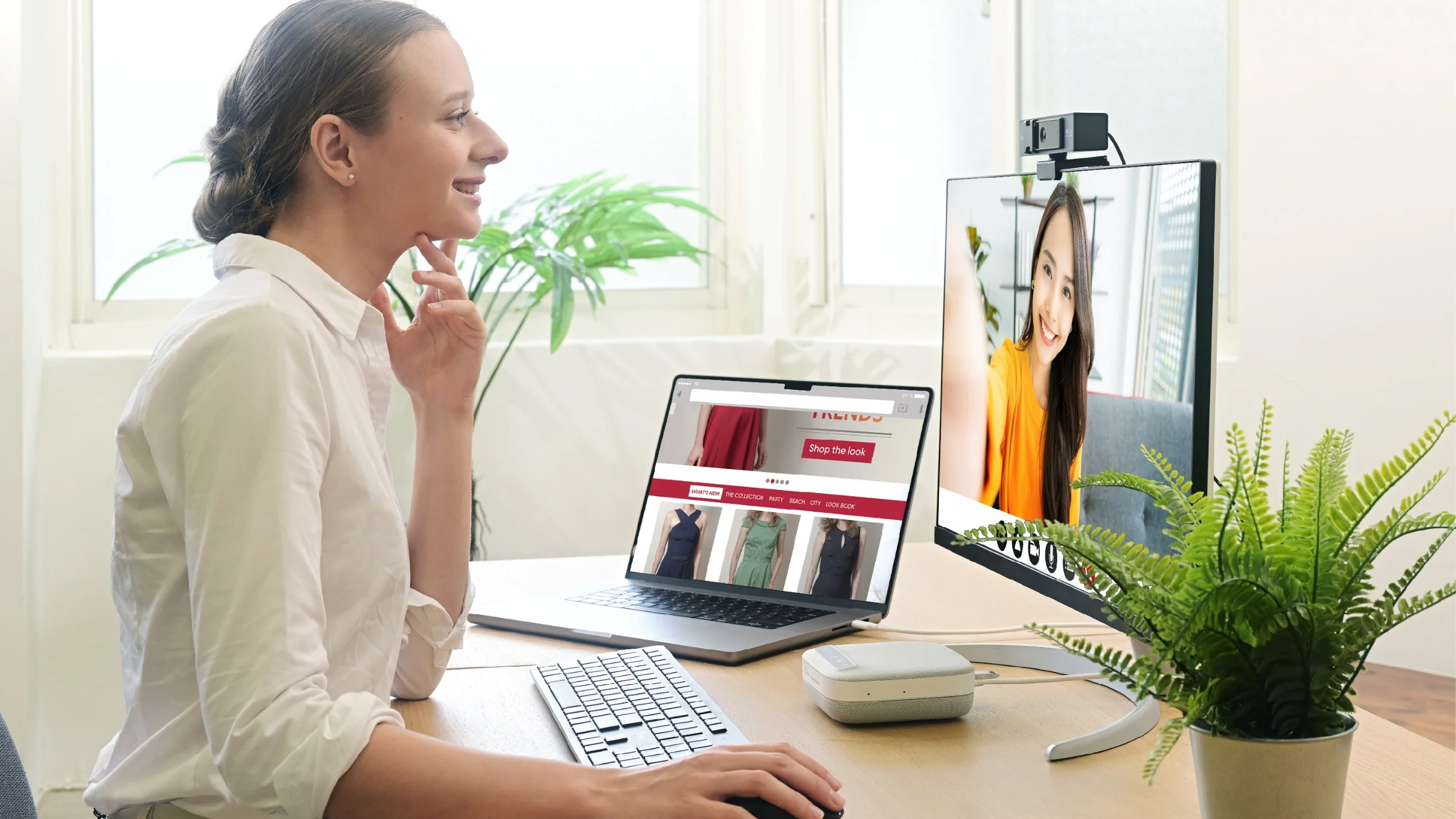 j5create Speakerphone Docking Station used by woman in office j5create Speakerphone Docking Station used by woman in office