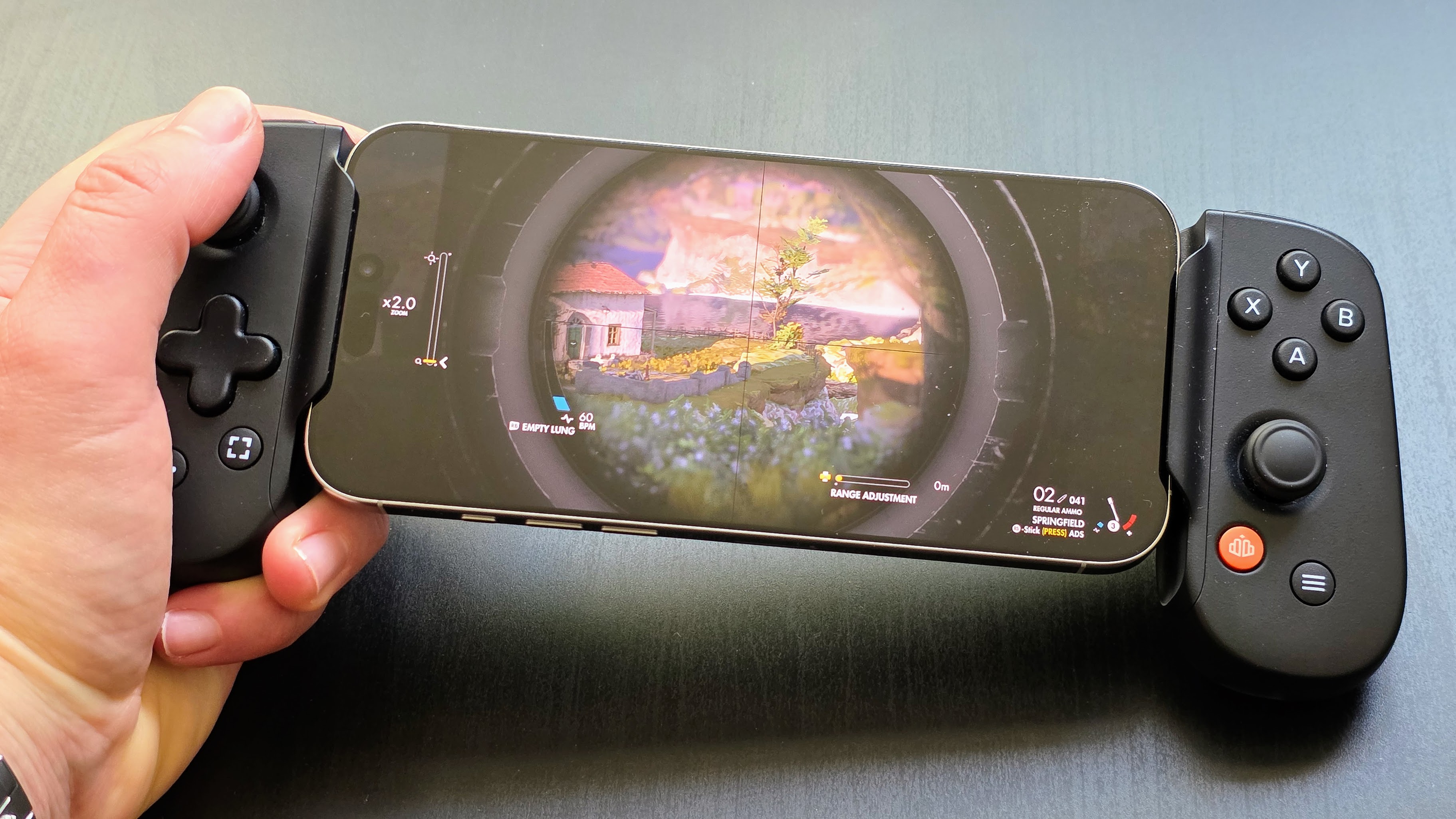 An image of Sniper Elite 4 running on an iPhone 16 Pro Max