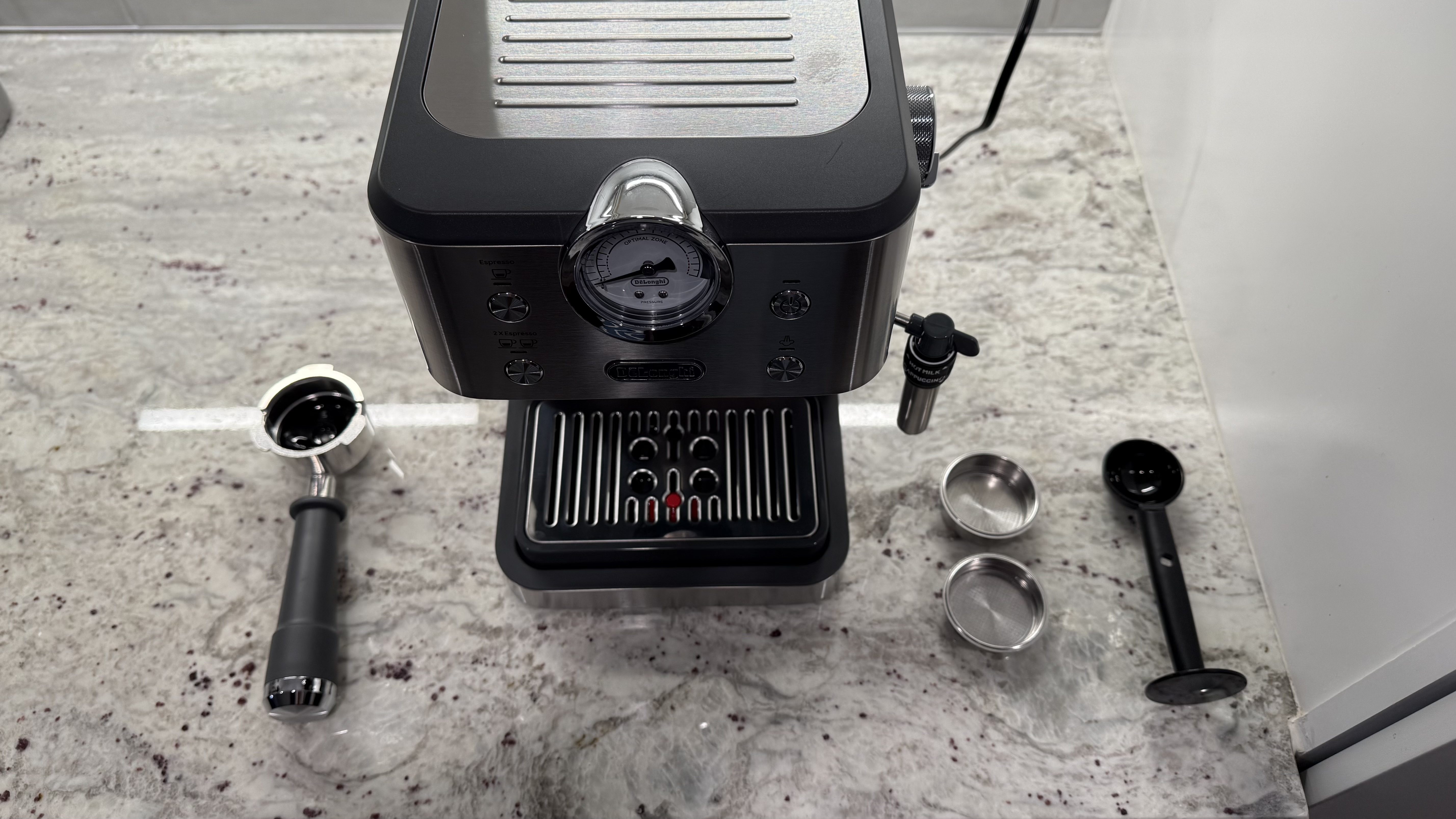 De'Longhi Linea Classic Espresso Machine with everything included flat lay