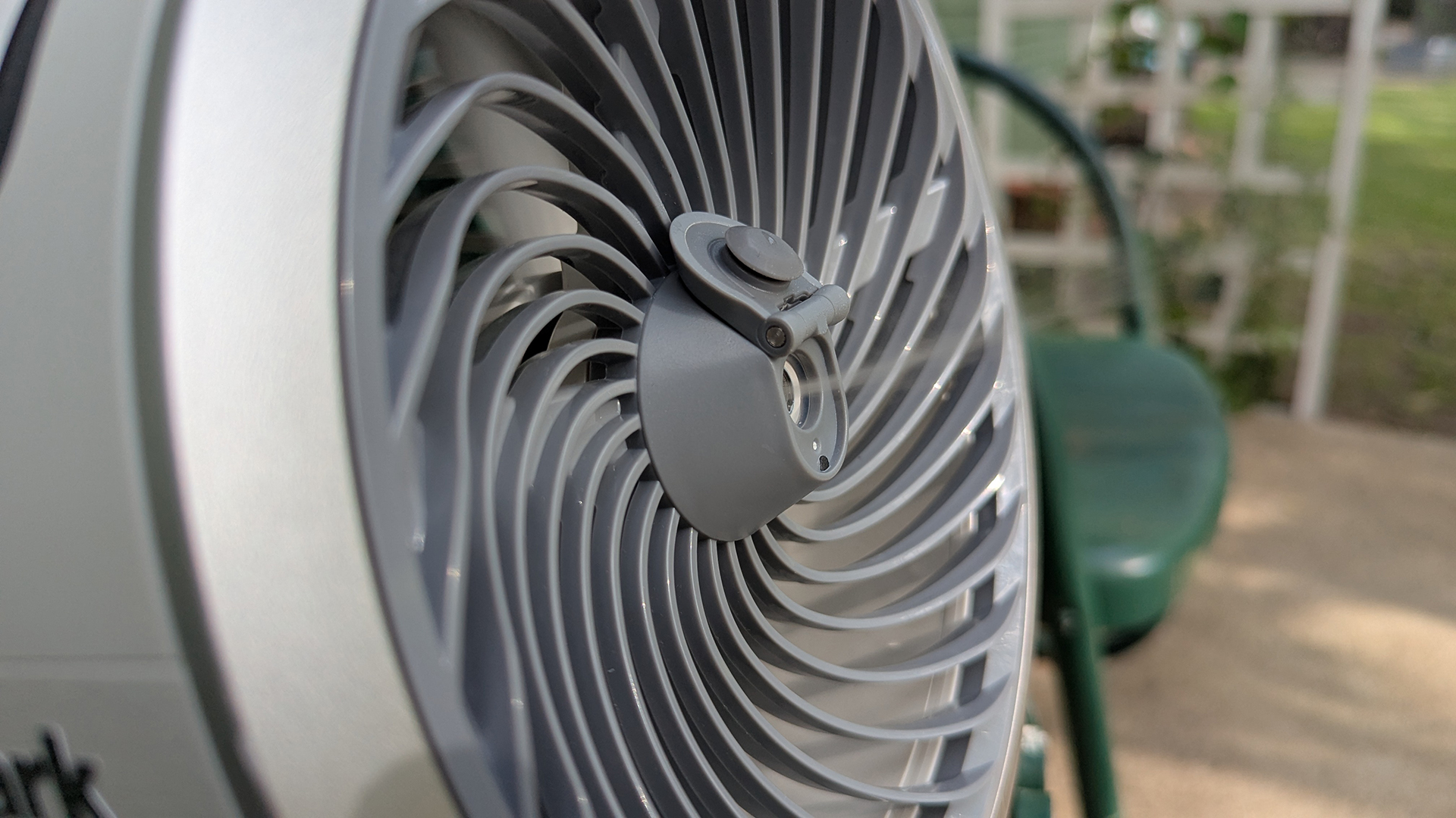 Shark FlexBreeze HydroGo portable fan in a garden