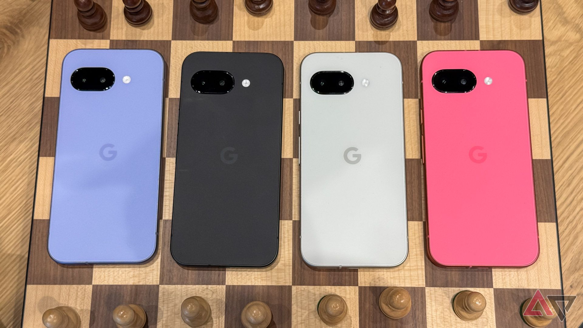 The Pixel 9a family placed on a chess board.