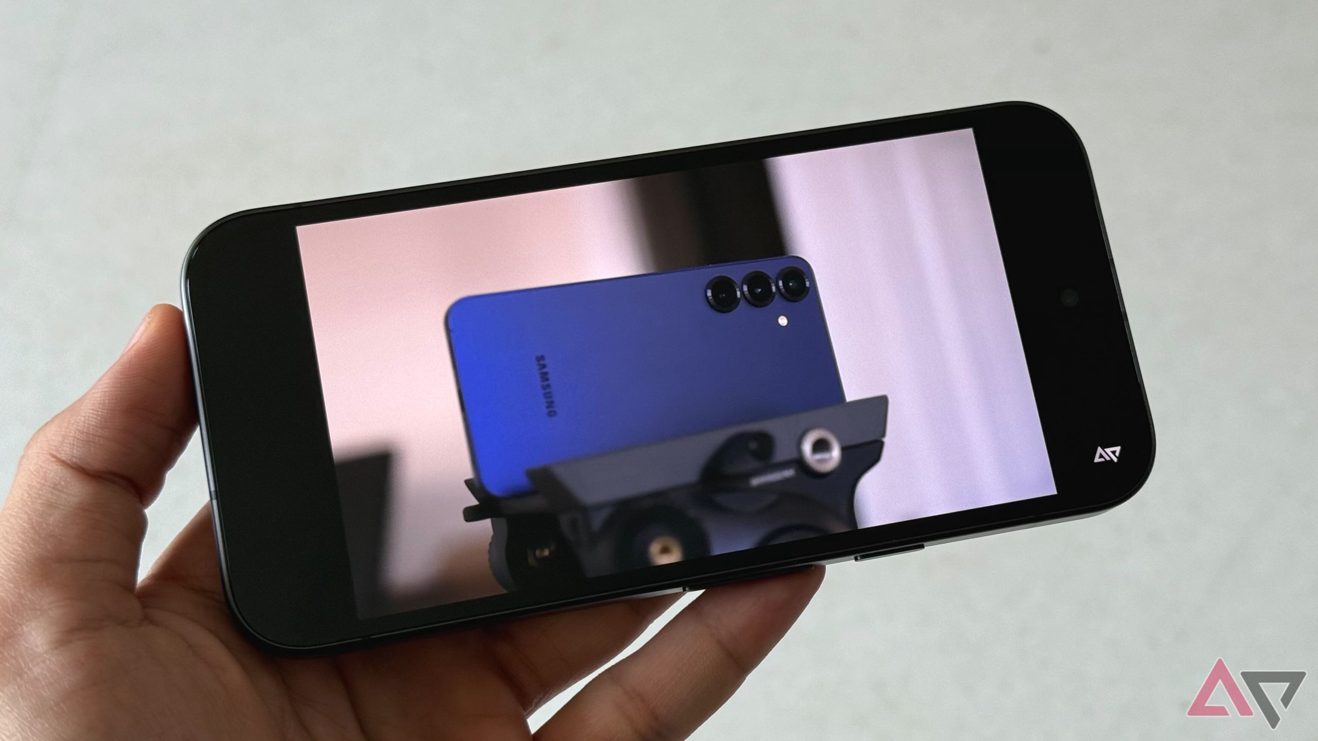 Pixel 9a playing a video in landscape mode showcasing phone's bezels