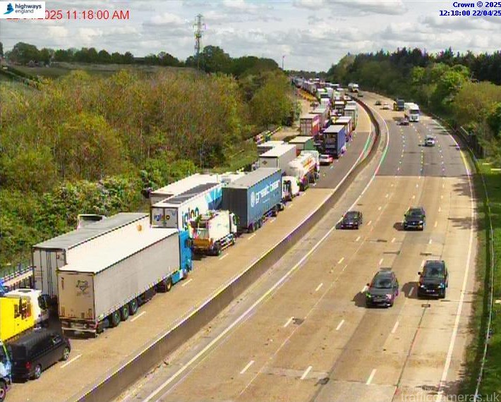 M25 motorway traffic jam between junctions 25 and 26 due to a police incident.
