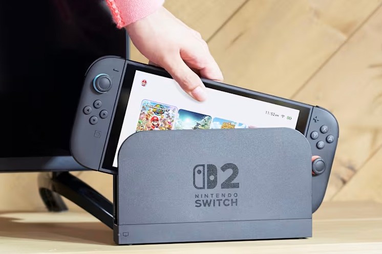 An image of someone removed the Nintendo Switch 2 from its dock.