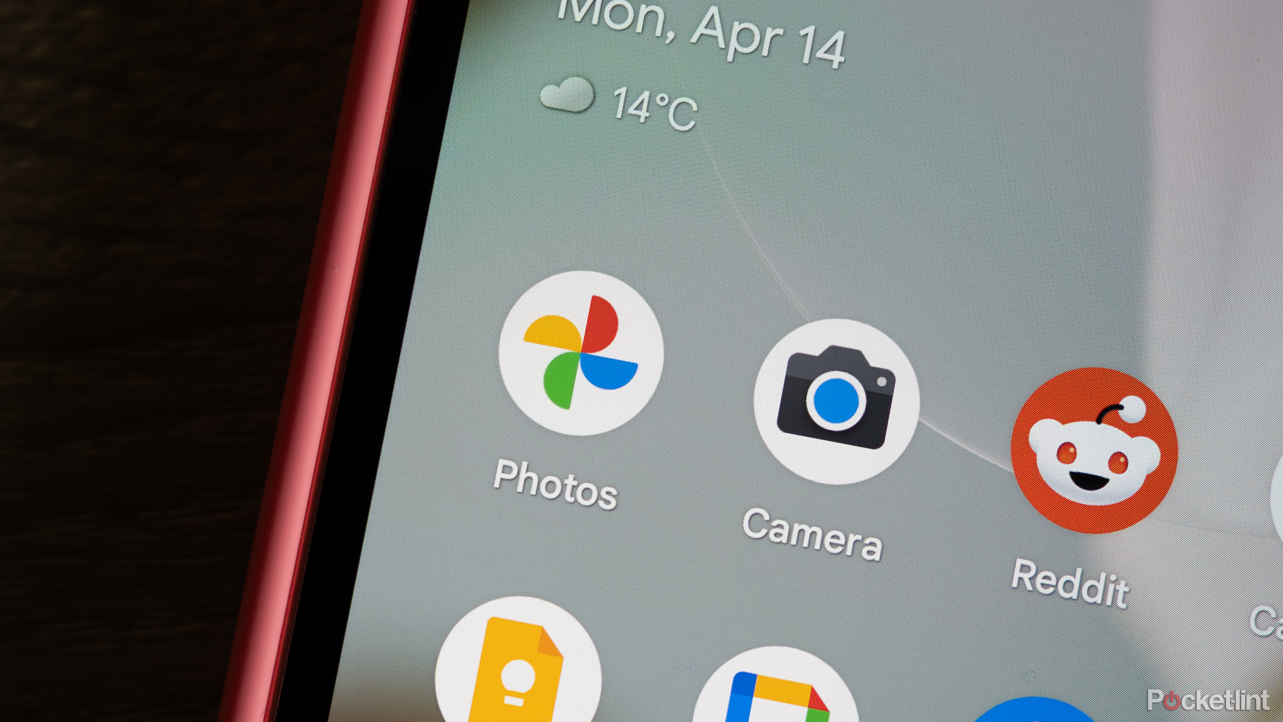 The Google Photos app icon on the Pixel 9a.