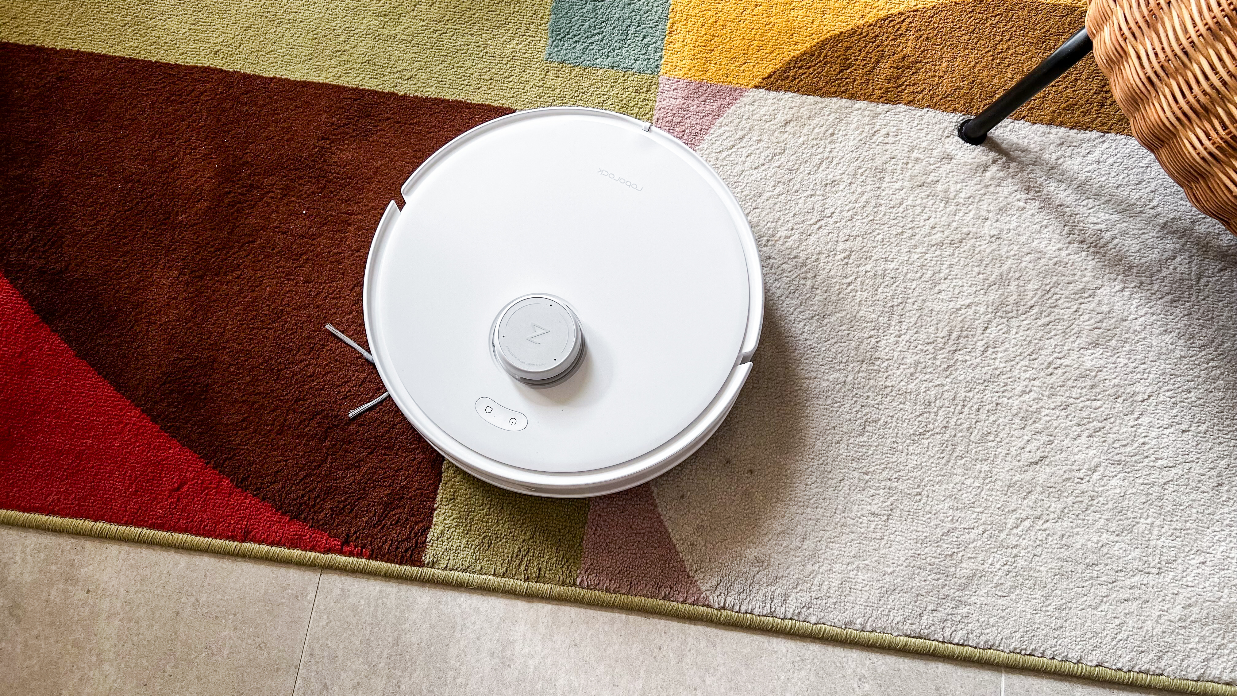 Roborock Qrevo Edge on a colorful carpet