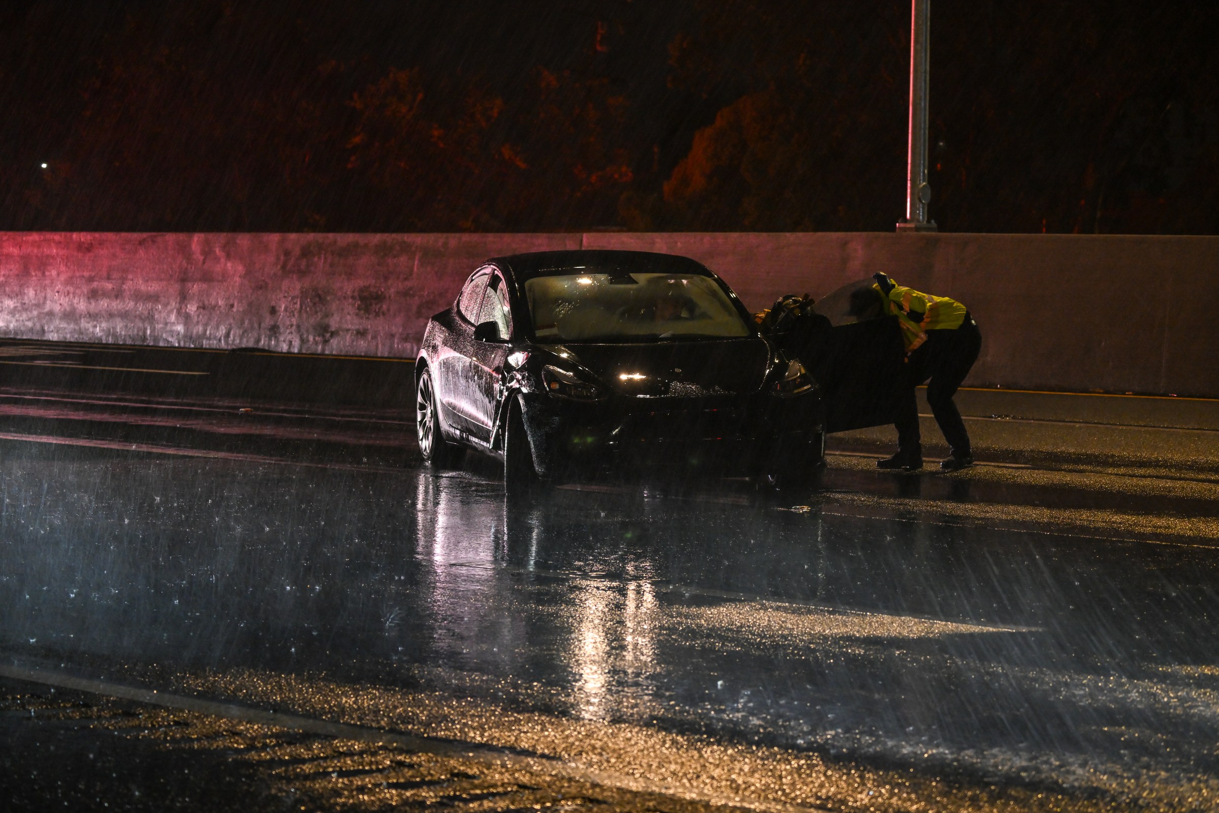 SAN MATEO, CA - MARCH 21: Four cars including a Tesla were involved an accident during heavy rain on Highway 101 southbound in San Mateo, California, United States on March 21, 2023 as atmospheric river storms hit California. (Photo by Tayfun Coskun/Anadolu Agency via Getty Images)