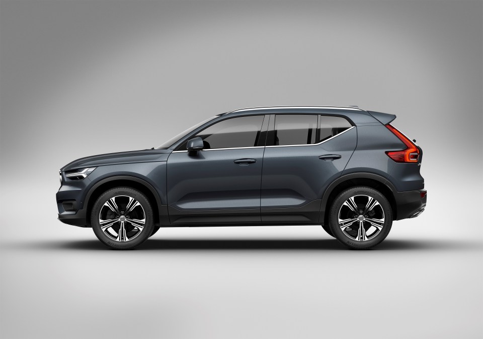 Side view of a dark gray Volvo XC40.