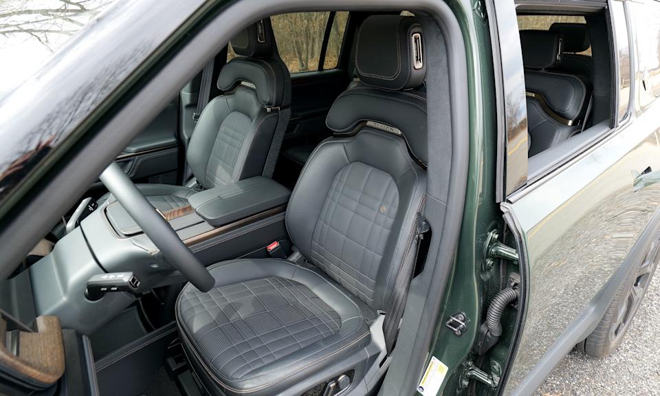 Rivian's interior on the R1S combines the feel of a traditional cabin with lots of lovely modern touches.