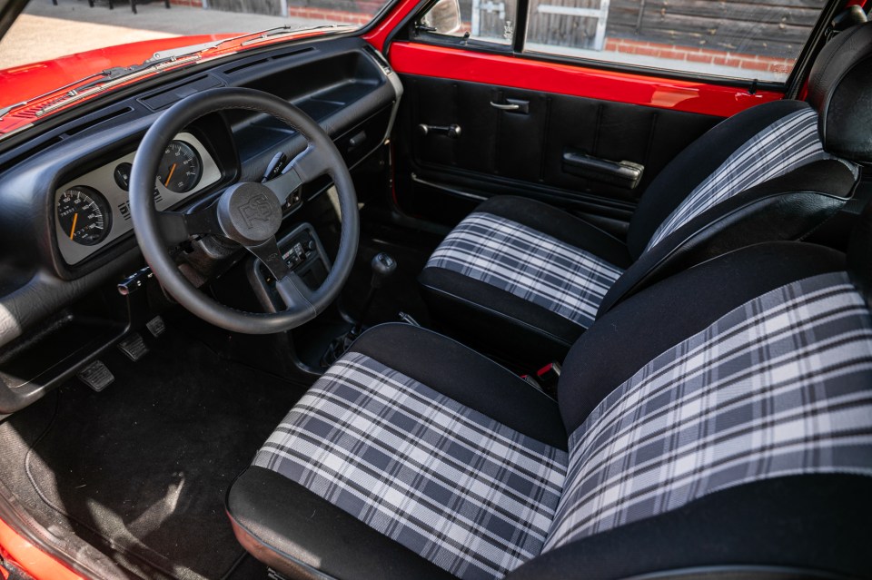 Interior of a red 1981 Ford Fiesta Supersport.