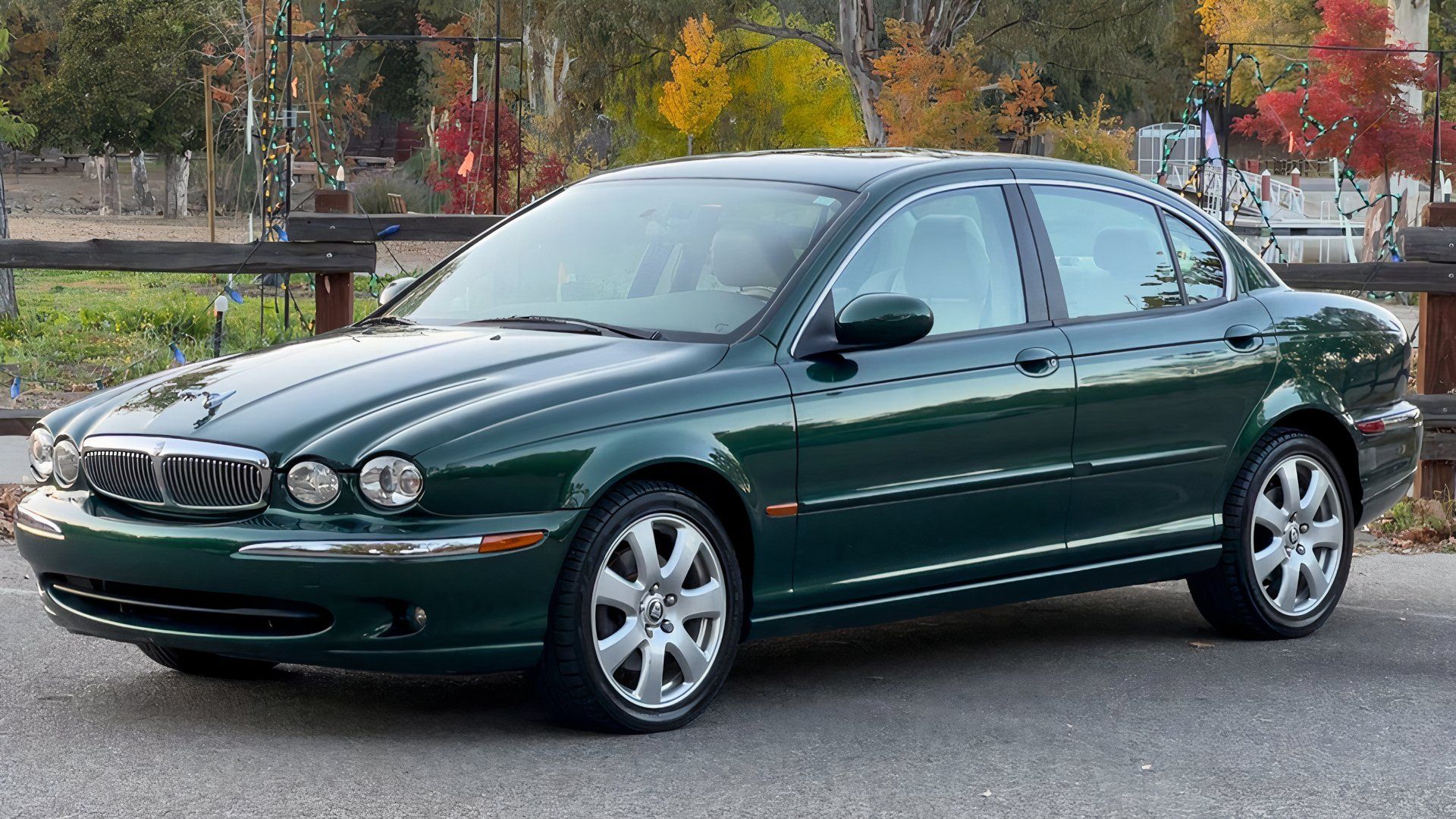 2005 Jaguar X-Type in green parked in parking lot