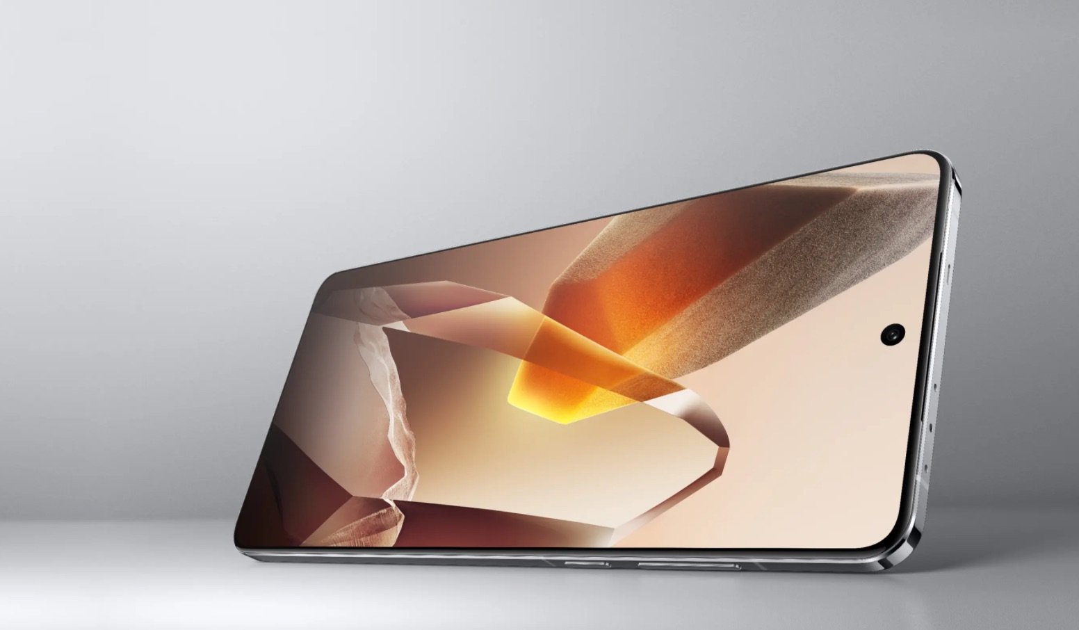 OnePlus 13 resting on its side with warm abstract wallpaper on the screen