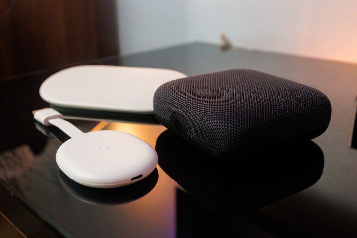 Chromecast with Google TV and the Onn 4K Pro stand in front of the new Google TV Streamer.