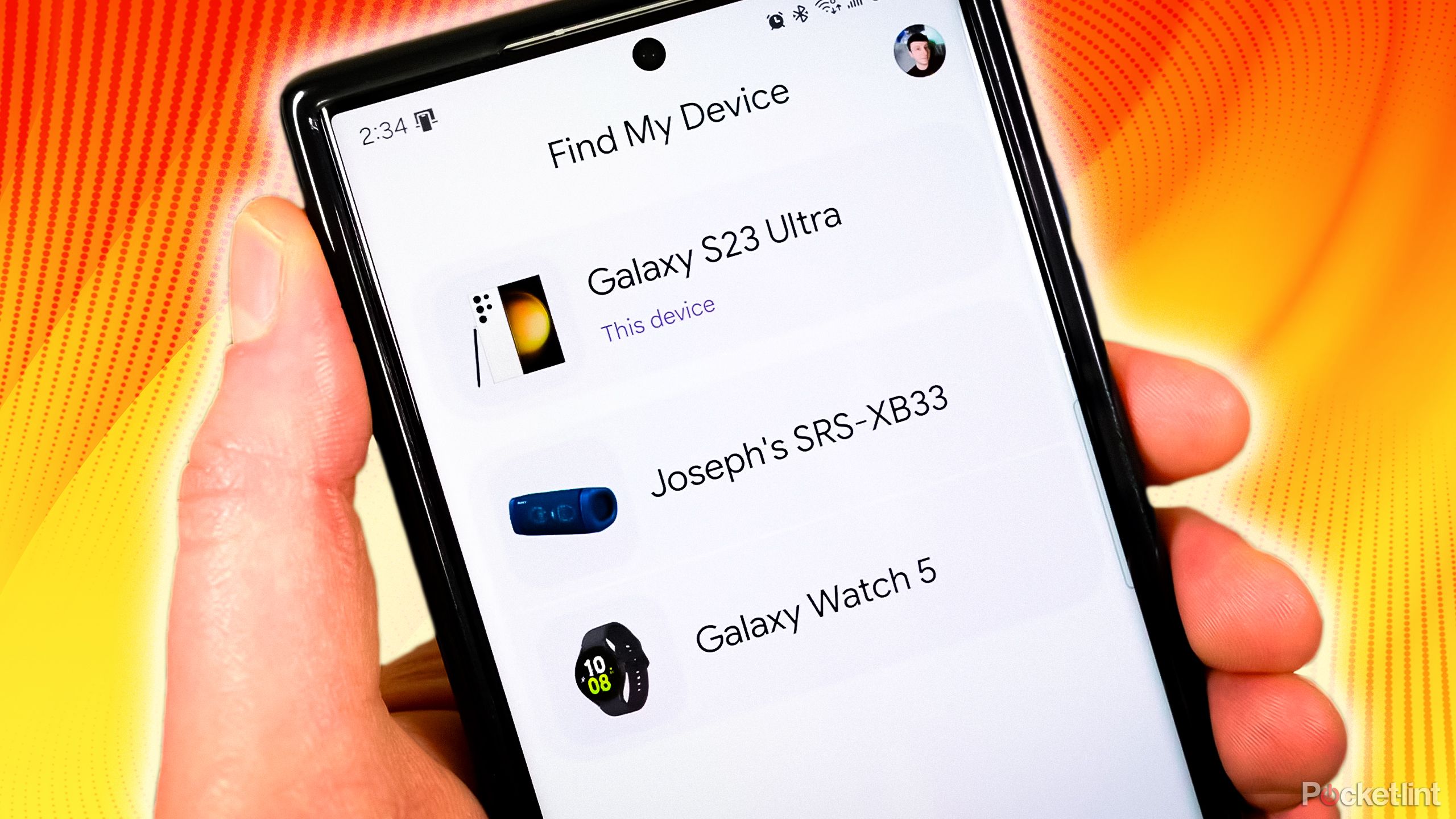 A person holding a phone with Google's Find My Device pulled up.