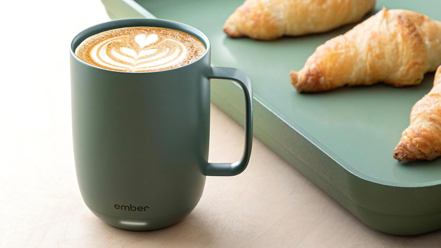 Green Ember Mug 2 next to pastries Green Ember Mug 2 next to pastries