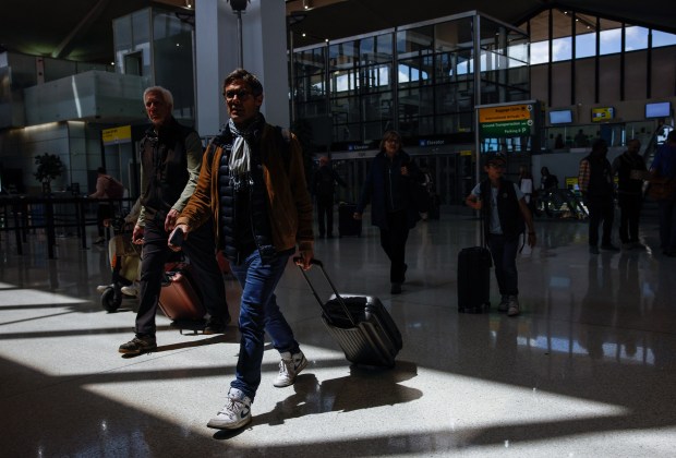 Passengers arrive at Terminal B at Newark Liberty International Airport in Newark, New Jersey last week.(Photo by Kena Betancur/AFP, File)