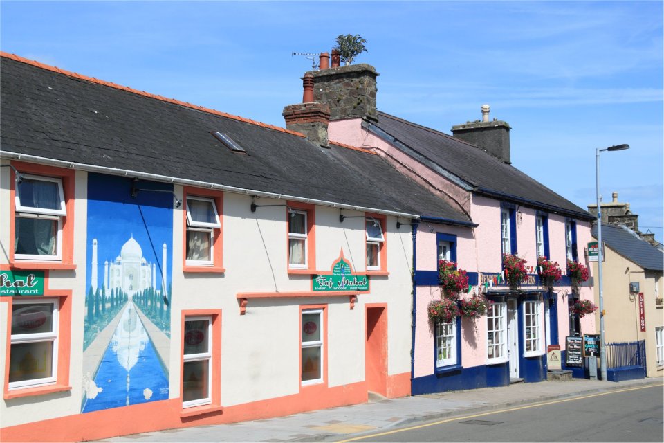 Taj Mahal Restaurant and Bennetts Navy Tavern on High Street in Fishguard, Wales.