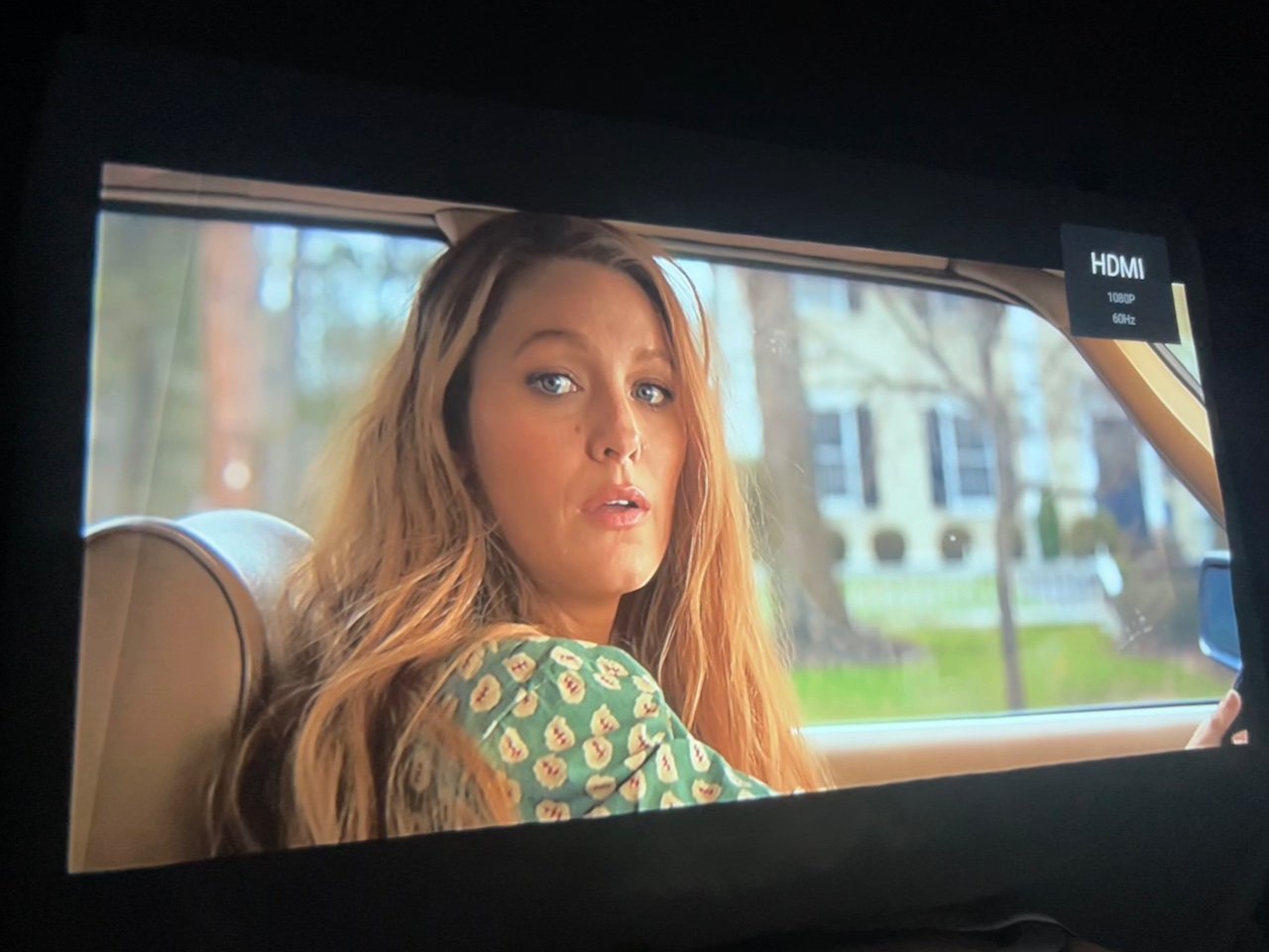 Movie projection showing Blake Lively in car