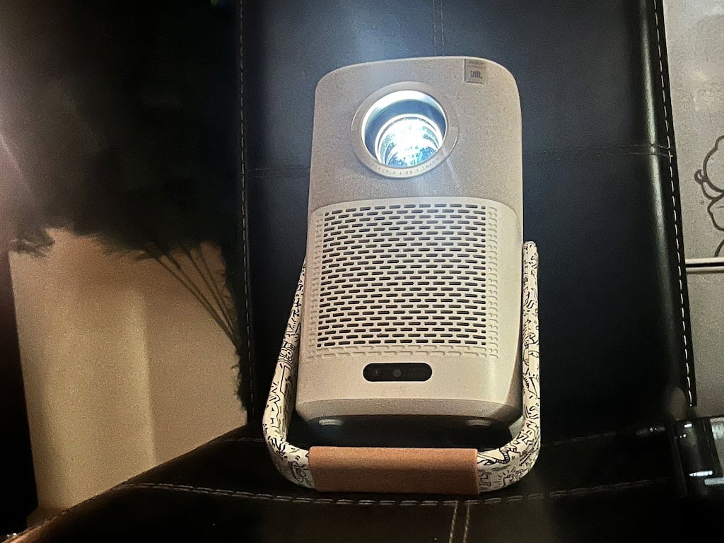 Close-up shot of Yaber T2 Plus projector turned on