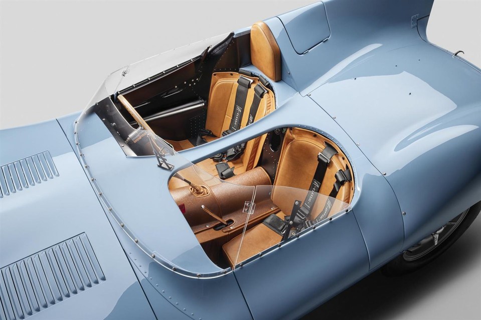 Pastel blue Jaguar D-Type Long Nose sports car interior.