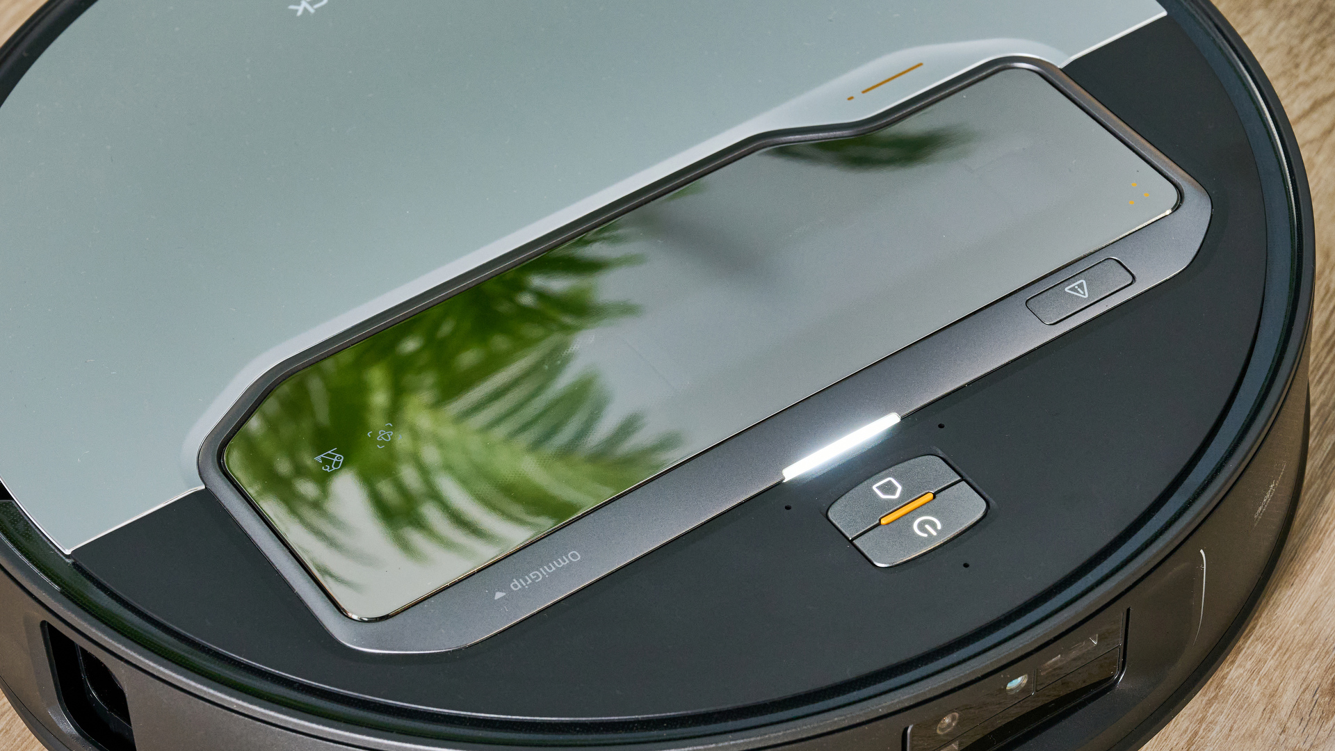 Close up of hatch on top of Roborock Saros Z70 robot vacuum