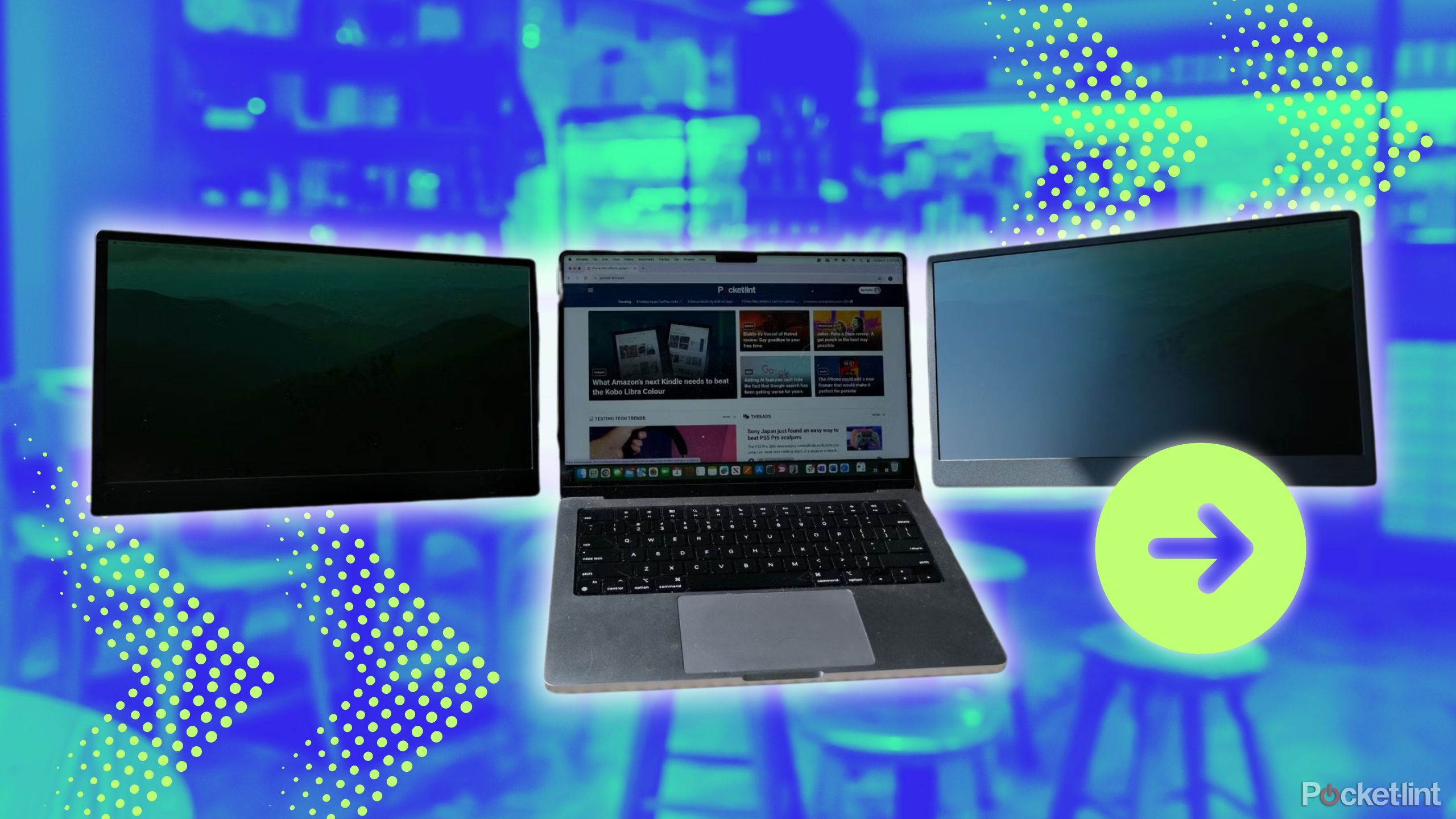Two portable monitors on the sides of a macbook.