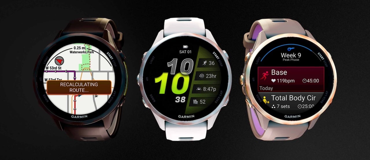 Three colourful Garmin Forerunner 970 watches
