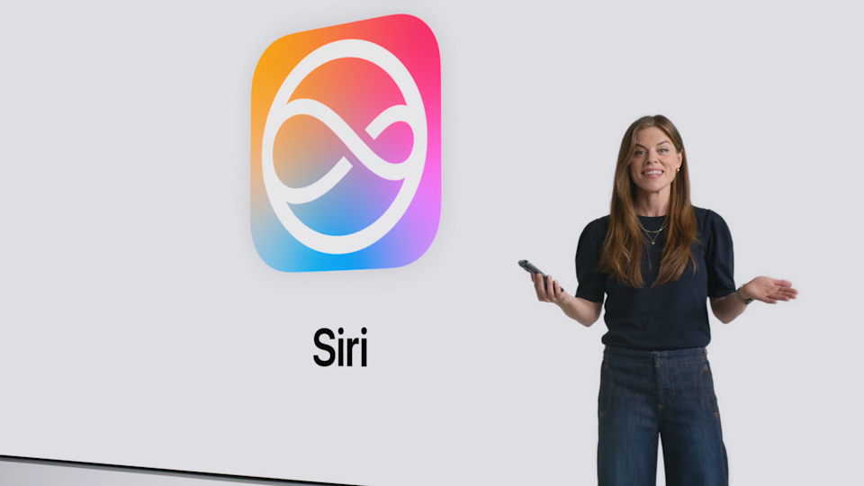 Apple's Kelsey Peterson in front of a board with Siri's name and logo.