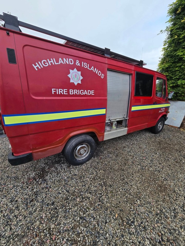 Red fire engine converted into a campervan.