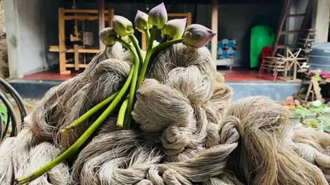 Bijayshanti Tongbram A pile of yarn made from lotus