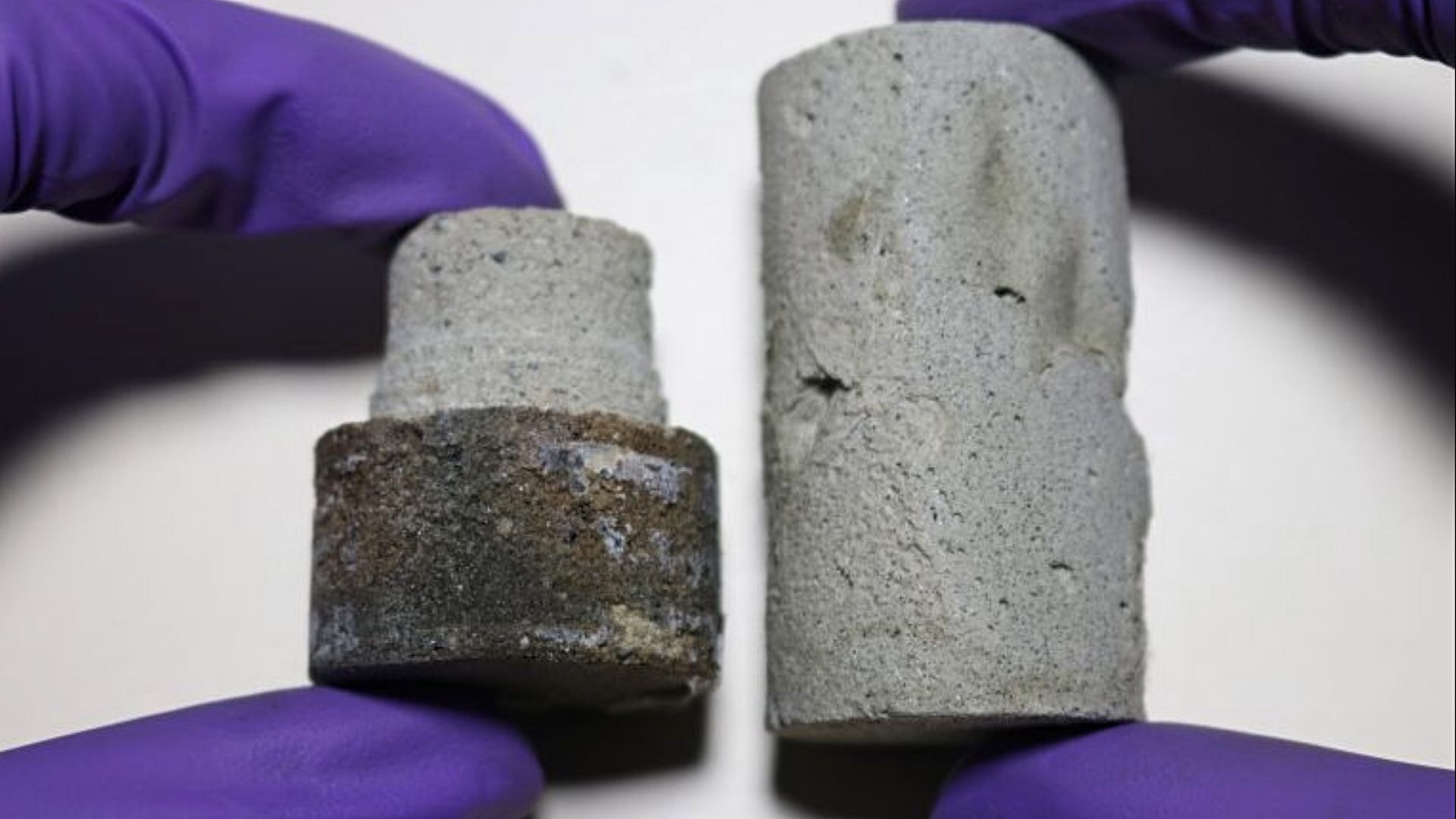 Machined and non-machined lunar brick sample held side by side.