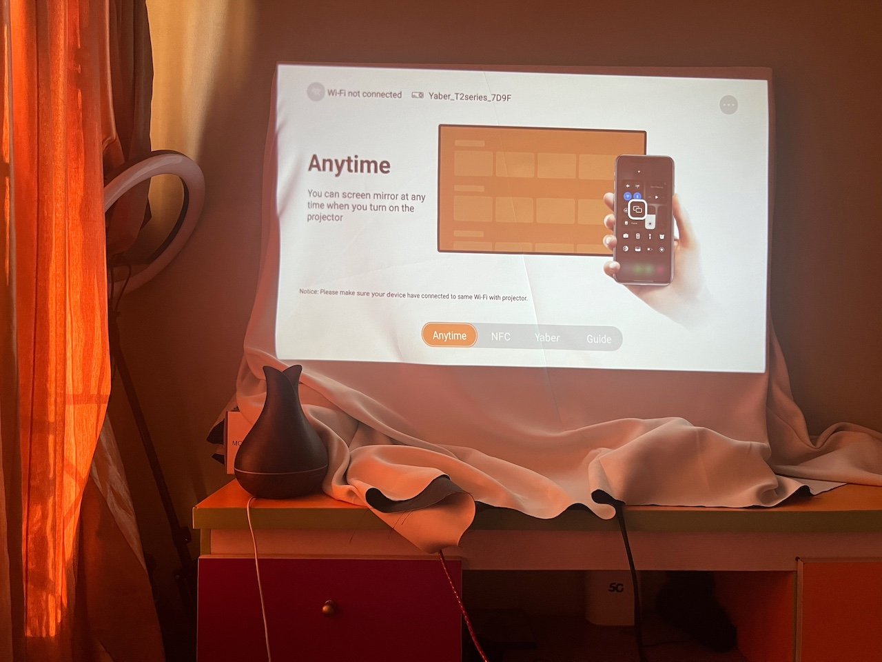 Pairing screen for casting phone content to projector
