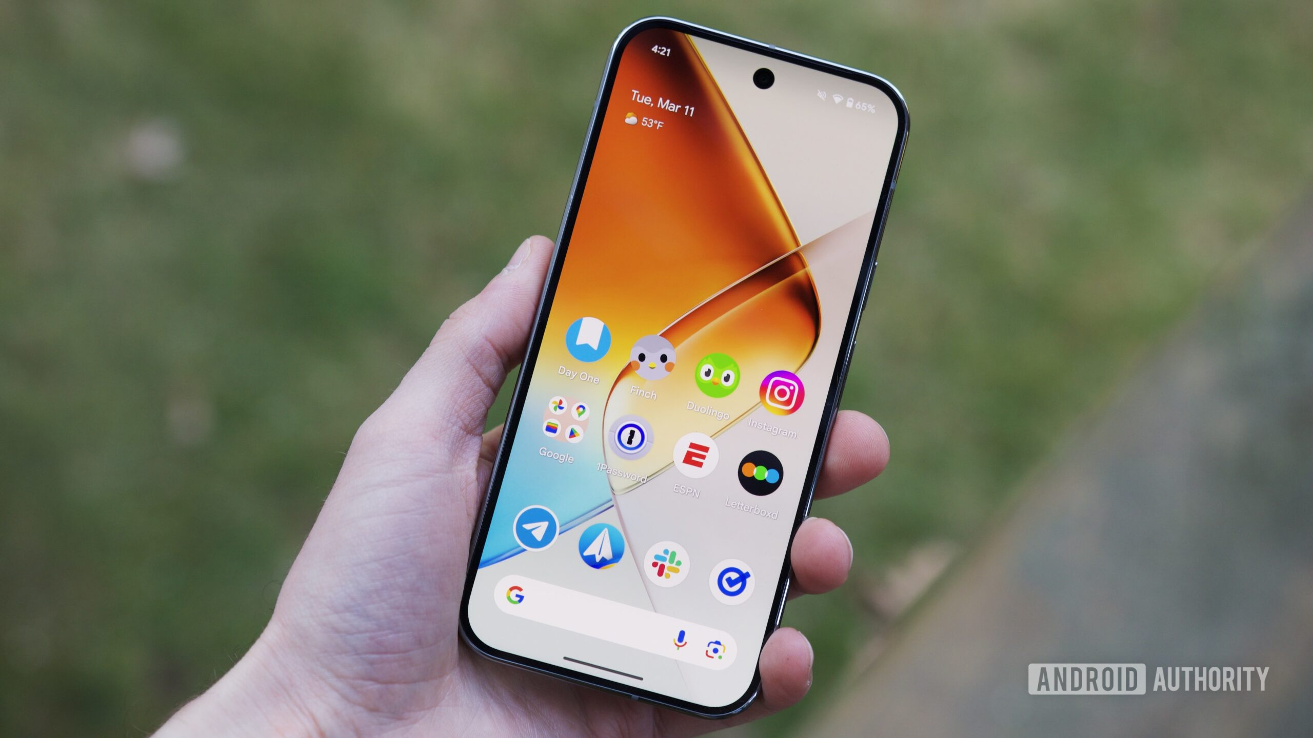 google pixel 9 pro in hand screen 1 Someone holding a Google Pixel 9 Pro with its screen on.