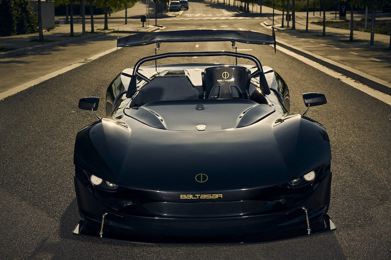 Baltasar Unleashes the Revolt R Concept: A Track-Only EV Built for Pure Speed A New Contender Emerges from Spain's Electric Frontier Baltasar, the Spanish EV brand making waves with its handcrafted electric sports cars, has just turned up the intensity with the unveiling of its latest creation: the Revolt R. This track-only concept builds on the DNA of the original road-going Revolt, first introduced in 2021, but strips away street-legal constraints in favor of unfiltered performance. With a chassis carved from carbon fiber and a hyper-focused motorsport build, the Revolt R is shaping up to be a bold addition to the growing segment of electric track weapons. Set to complement the production version of the road-going Revolt—scheduled to begin rolling out in 2026—the Revolt R embraces a no-compromise ethos. From its aerodynamically aggressive bodywork to its featherweight construction and race-ready interior, this EV is all about pushing boundaries where the stopwatch is the only judge. Aggressive Aero Meets Lightweight Craftsmanship At first glance, it’s clear the Revolt R means business. Its carbon fiber shell is complemented by a chromoly steel safety cage that meets FIA regulations, offering both rigidity and safety without piling on the pounds. A custom-developed aerodynamic package includes a redesigned front end, splitter, side skirts, and a massive rear wing outfitted with a DRS (Drag Reduction System), usually seen in Formula One. These features aren’t just for show—they’re engineered to increase downforce and reduce drag where it matters most: high-speed corners and straight-line sprints. One of the standout elements of the Revolt R is its incredible weight—or rather, lack thereof. Tipping the scales at under 1,800 pounds, it leverages a combination of advanced materials including aerospace-grade aluminum, Kevlar, and carbon fiber. The result is a power-to-weight ratio that promises blistering performance without the need for an oversized battery or motor configuration. A Driver-Centric Cockpit with Racing Intentions Inside, Baltasar hasn’t wasted a single gram. The Revolt R ditches luxuries in favor of purpose-built race gear. A carbon racing seat, certified by the FIA, anchors the driver in place, while a removable Formula-style steering wheel adds a layer of functionality typically reserved for professional race teams. The entire interior is designed around the driver, from control accessibility to weight distribution, echoing the laser focus of dedicated track cars like the Radical SR10 or KTM X-Bow GT-XR. Every inch of the Revolt R’s cabin serves a performance purpose. There’s no infotainment screen, no climate control, and certainly no unnecessary trim. What you get instead is a stripped-down racing environment optimized for telemetry, control feedback, and uninterrupted focus. It’s more cockpit than cabin—exactly what you’d expect from a machine engineered to live at the limit. Powertrain Mystery Adds to the Intrigue Baltasar has yet to disclose full technical specs for the Revolt R’s electric powertrain, though hints suggest it may match—or exceed—the road-going Revolt’s twin-motor setup that delivers 500 horsepower to the rear wheels. If that carries over, or is tuned further for track use, the Revolt R could be a serious threat in the EV track-day space. Even without confirmed figures, expectations are high. The standard Revolt already boasts a 0–60 mph time under 3 seconds and a lightning-quick recharge time of just five minutes to 80% on a fast DC charger. Assuming similar or enhanced capabilities, the Revolt R could deliver extended stints on the track without sacrificing charging convenience—a major hurdle for many performance EVs. The battery system, while not yet publicly detailed, is expected to feature advanced thermal management and rapid charging capability, aligning with Baltasar’s original engineering philosophy: maximum track performance with minimal downtime. Blending Electric Innovation with Racing Heritage Though Baltasar is still a relatively young name in the electric performance arena, its approach to car building echoes classic motorsport values. The Revolt R channels the same ethos found in legendary lightweight track cars, but updates it with modern electric architecture. The materials used, the aerodynamic detail, and the obsessive weight reduction all point to a team that understands the nuances of real-world racing. It’s rare to see an electric vehicle approach design with such purist discipline. Most EVs in the performance segment skew toward luxury or dual-purpose usability, but the Revolt R throws that template out the window. There are no creature comforts, no compromises for street legality—just pure function and performance. That makes it an outlier, but in the best way possible. What Comes Next for Baltasar With the production version of the road-going Revolt planned for 2026, Baltasar’s timing with the Revolt R couldn’t be better. It gives the brand a halo product to showcase on circuits and track events while generating anticipation for the consumer-facing model. More importantly, it positions the brand within a small but influential group of electric manufacturers who are building EVs for the love of driving, not just range anxiety and quiet commutes. As of now, no official release date or price has been announced for the Revolt R. Those details will likely arrive closer to the road car’s production kickoff. For now, the Revolt R remains a tantalizing concept—but one that already looks and feels ready to leave tire marks on the asphalt. To follow updates and learn more about Baltasar’s electric performance ambitions, visit their official website. Baltasar reveals the track-only Revolt R, a lightweight EV built for raw performance and speed. Baltasar Revolt R, electric track car, lightweight EV, performance electric vehicle, FIA-approved EV, carbon fiber sports car, track-only electric car, DRS active wing, rear-wheel drive EV, high-performance battery, DC fast charging EV, electric racing concept, EV lap time car, Baltasar electric vehicles, motorsport-grade EV, Photos courtesy of Baltasar