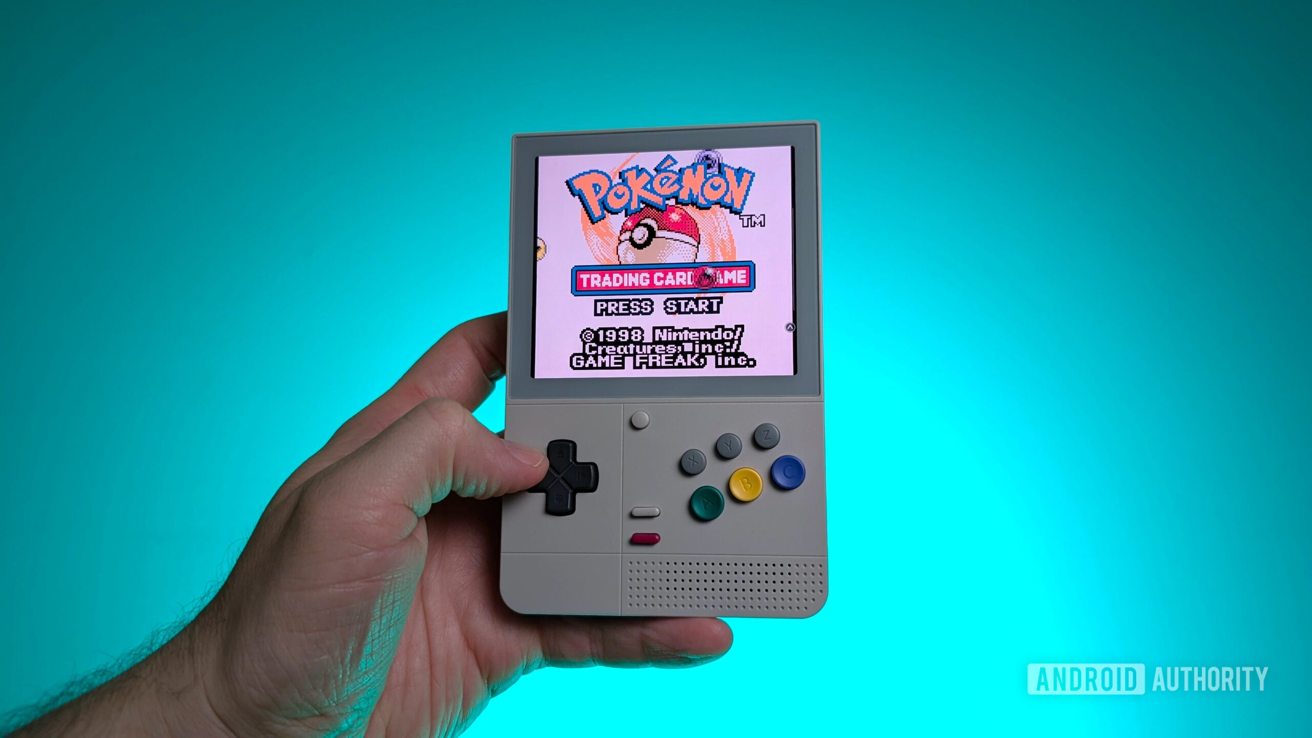 Retroid Pocket Classic Pokemon Trading card Game in hand Retroid Pocket Classic Pokemon Trading card Game in hand