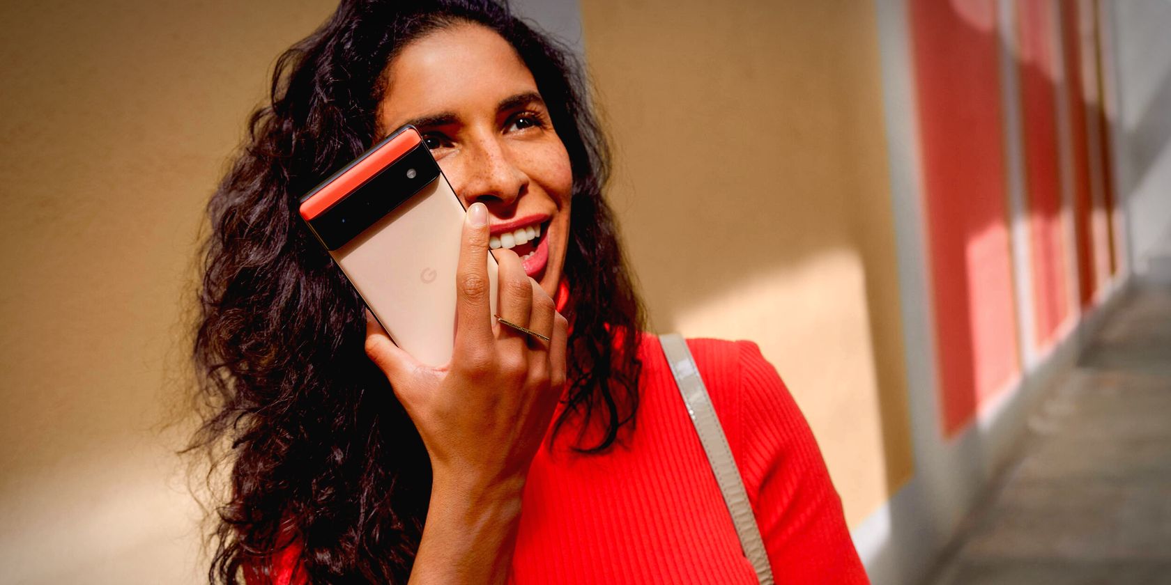woman holding google pixel 6 smartphone feature