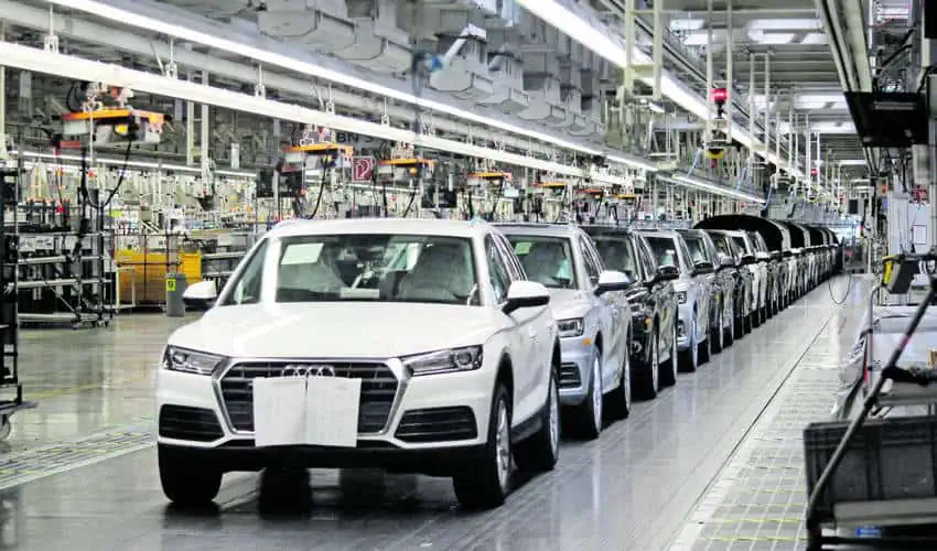 A line of Audi cars at a Mexican auto manufacturing plant