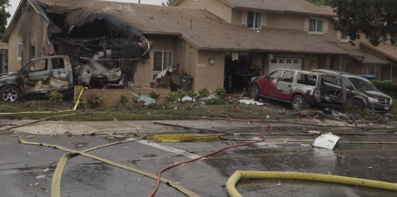 Burned home and cars