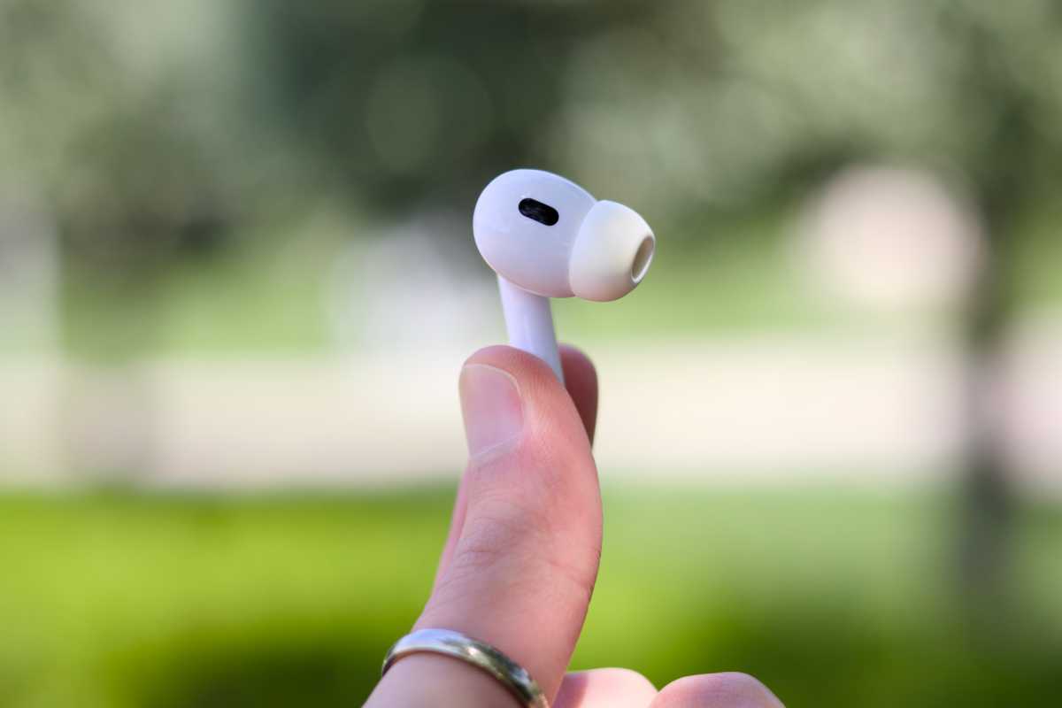AirPods Pro 2 held in hand